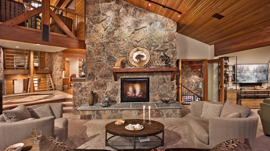 Great room with fireplace and plenty of plush seating