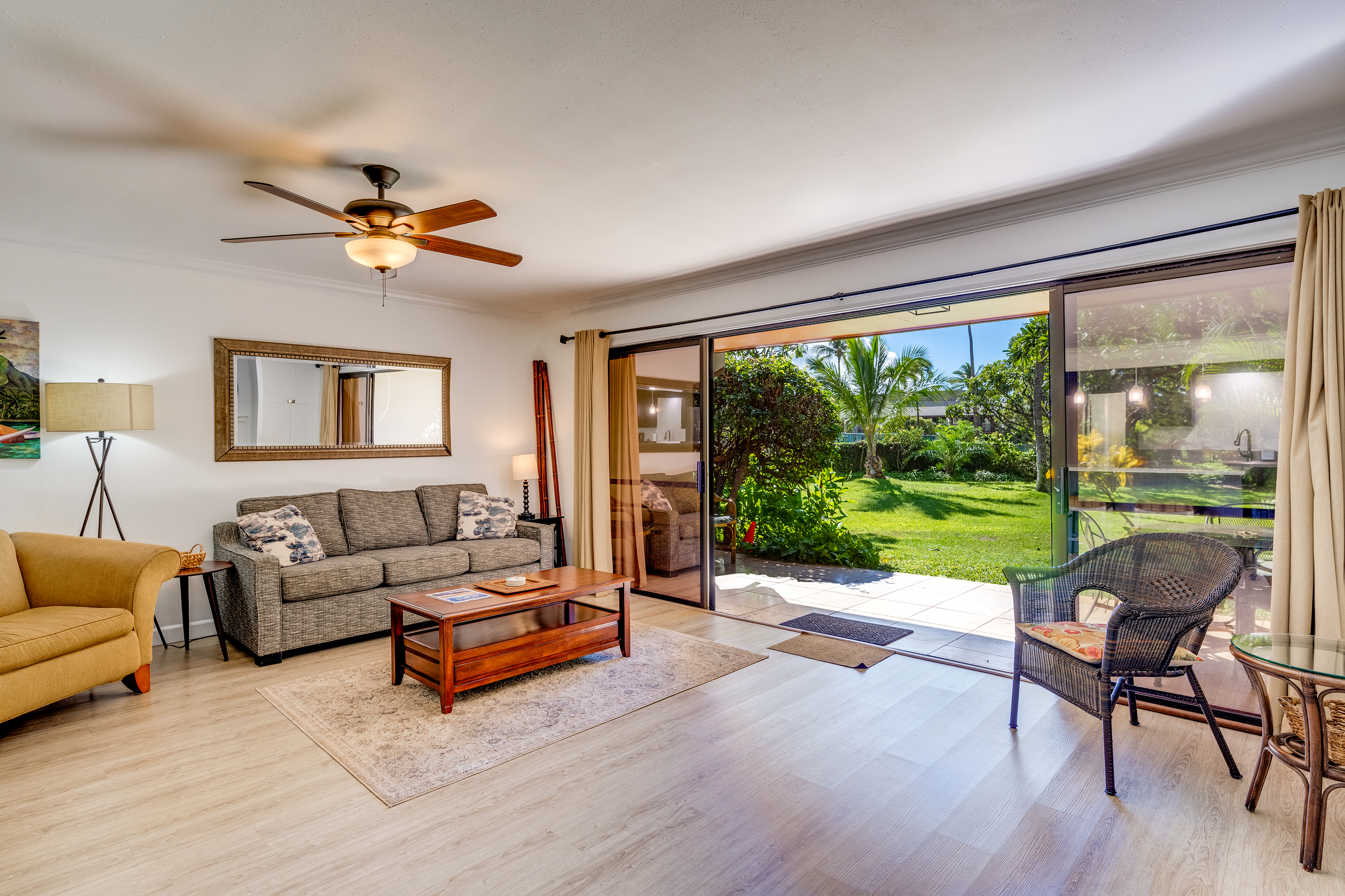 Seamless indoor-outdoor living with the lanai that connects to garden area and the pool, just steps away.