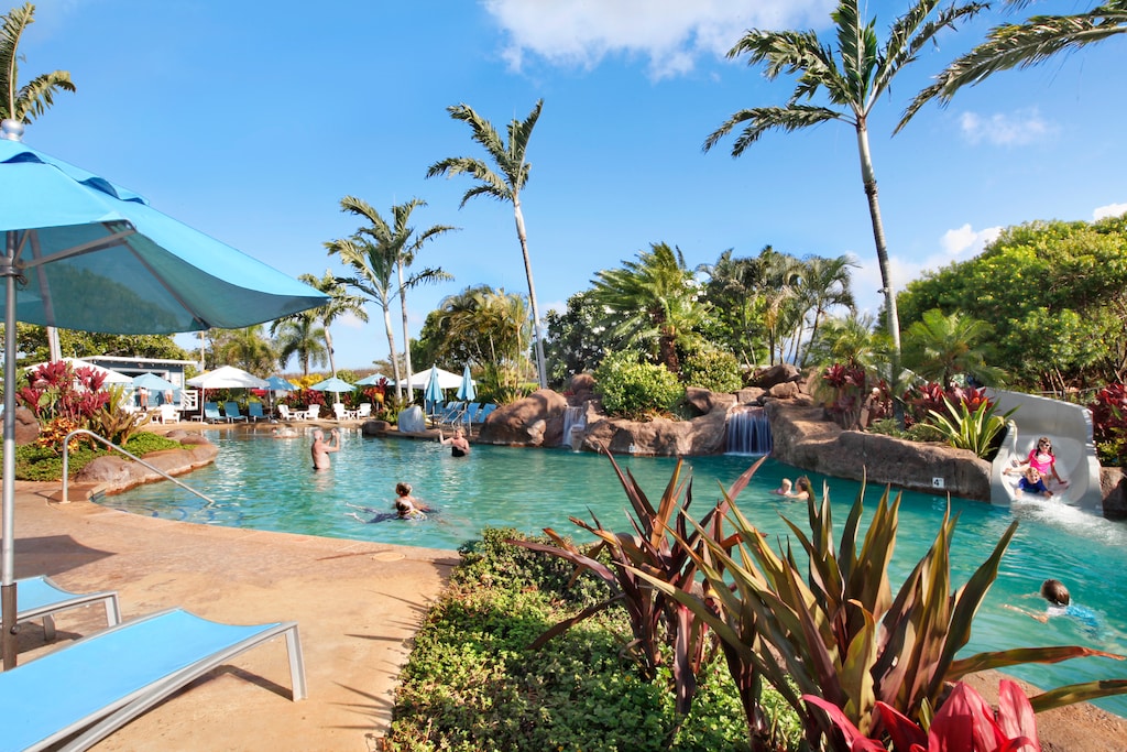 Enjoy exclusive access to the Poipu Beach Athletic Club, where a tropical pool, hot tub, and water slide await your family adventures.