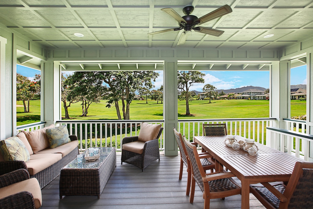 Relax on the covered lanai with sweeping views of the Kiahuna Golf Course and mountains, the perfect spot for morning coffee or evening cocktails.