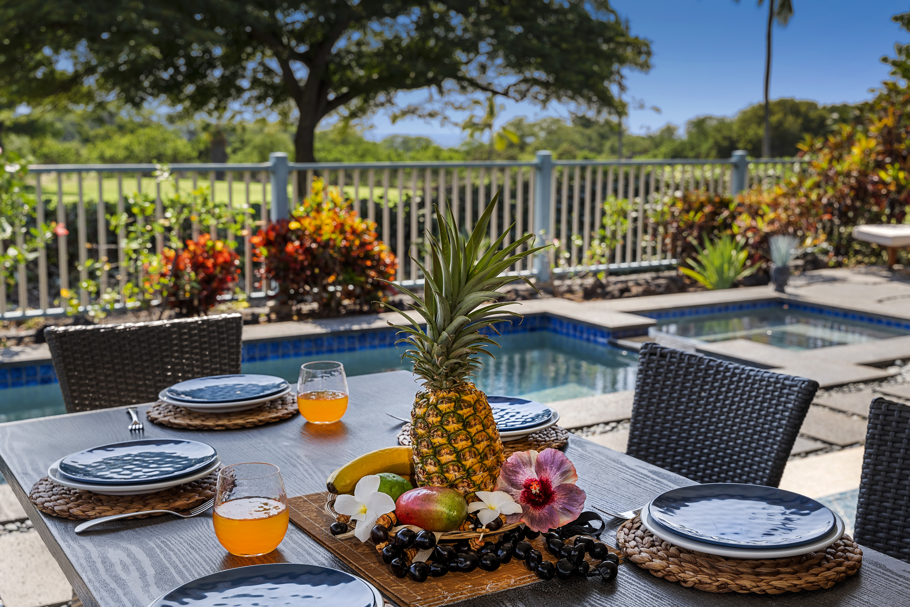 Nestled into an exclusive, gated community, this newly constructed Kailua-Kona vacation rental home boasts central air conditioning and a private pool and spa