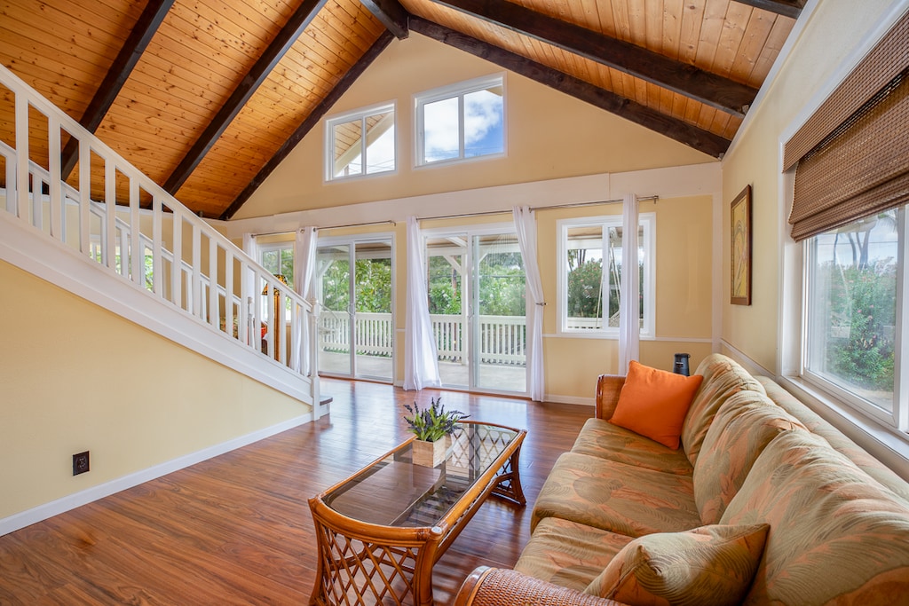 Gather with loved ones in the spacious living area filled with natural light and island charm.