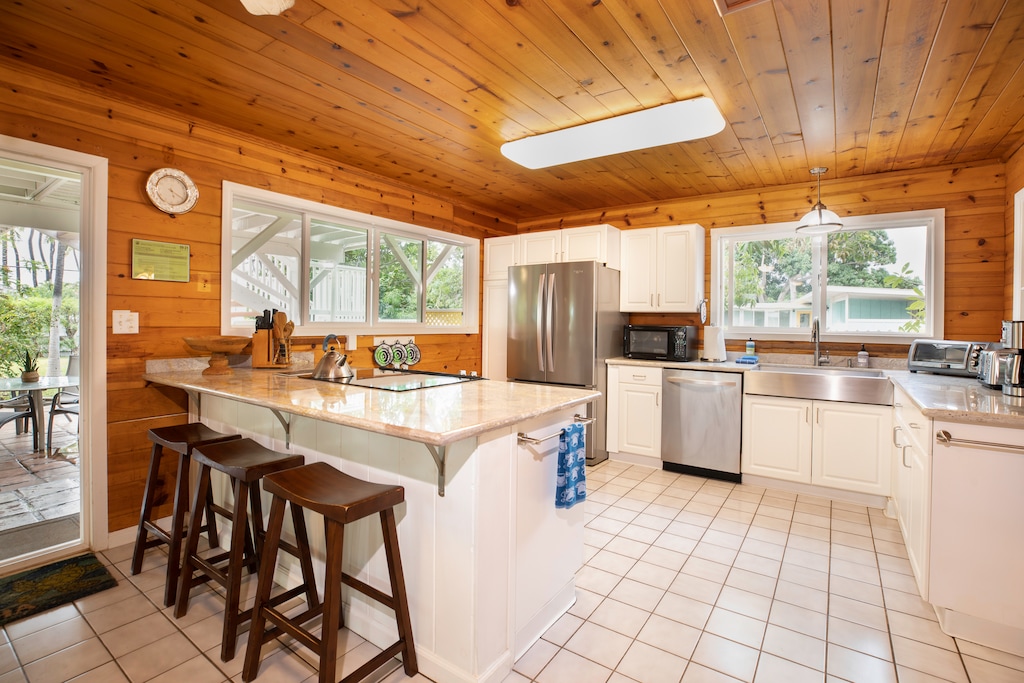 Share meals and conversations around the inviting breakfast bar.