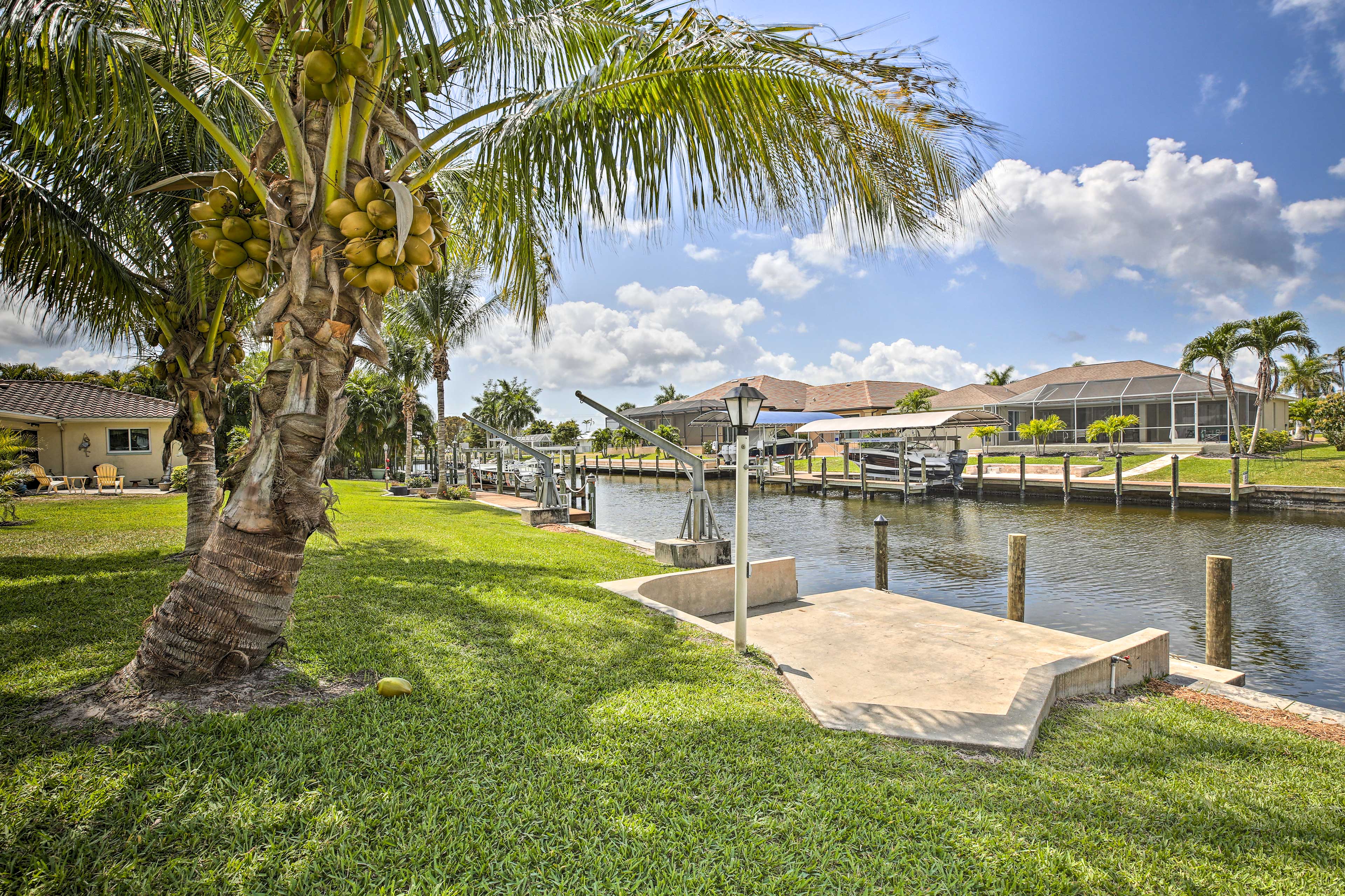 Property Image 1 - Bright Canalfront Home w/ Boat Dock, Patio, Grill!