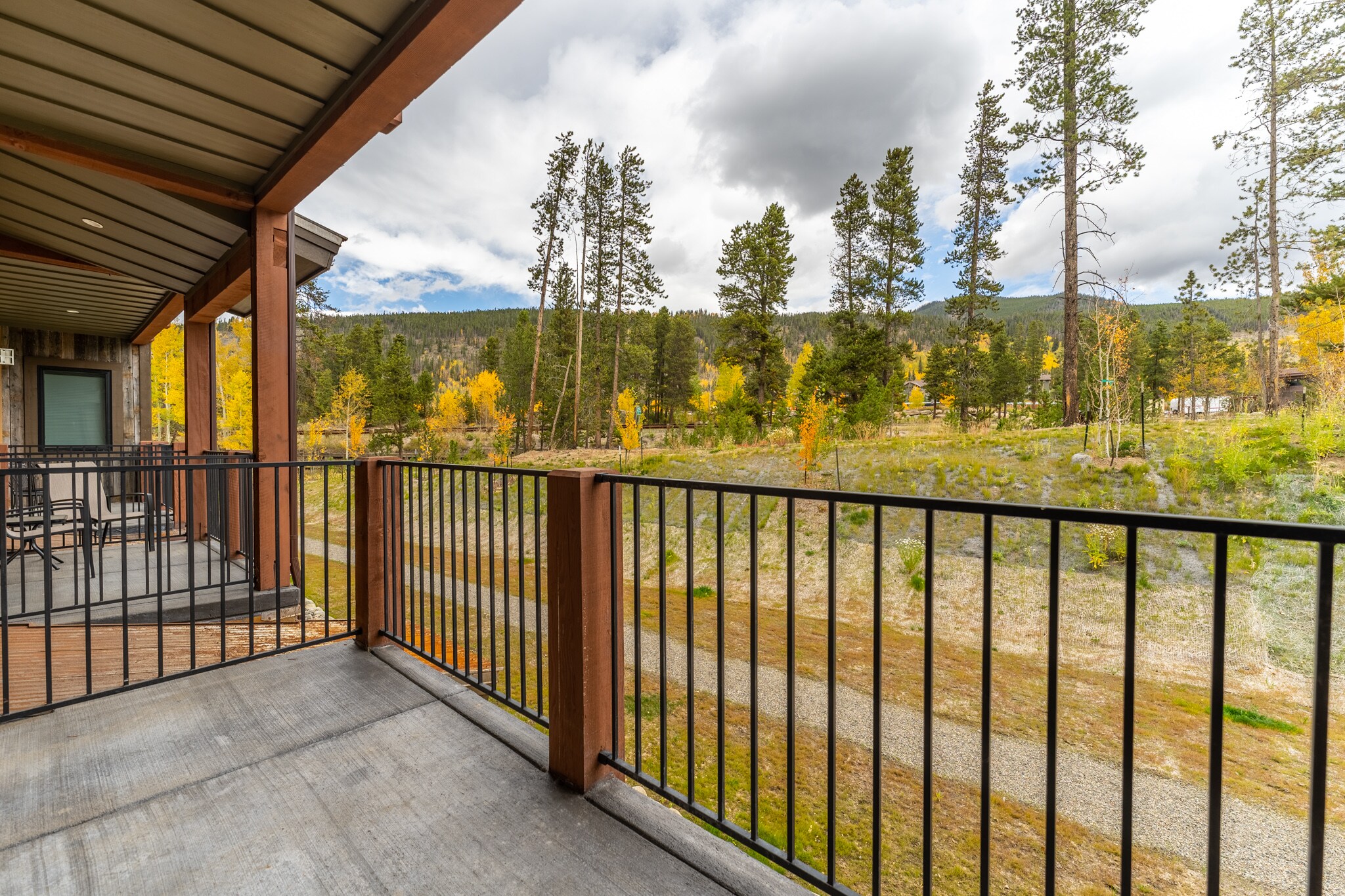 Private balcony offering mountain and scenic views. 