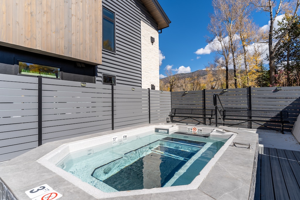 Communal outdoor hot tub for guest use. 