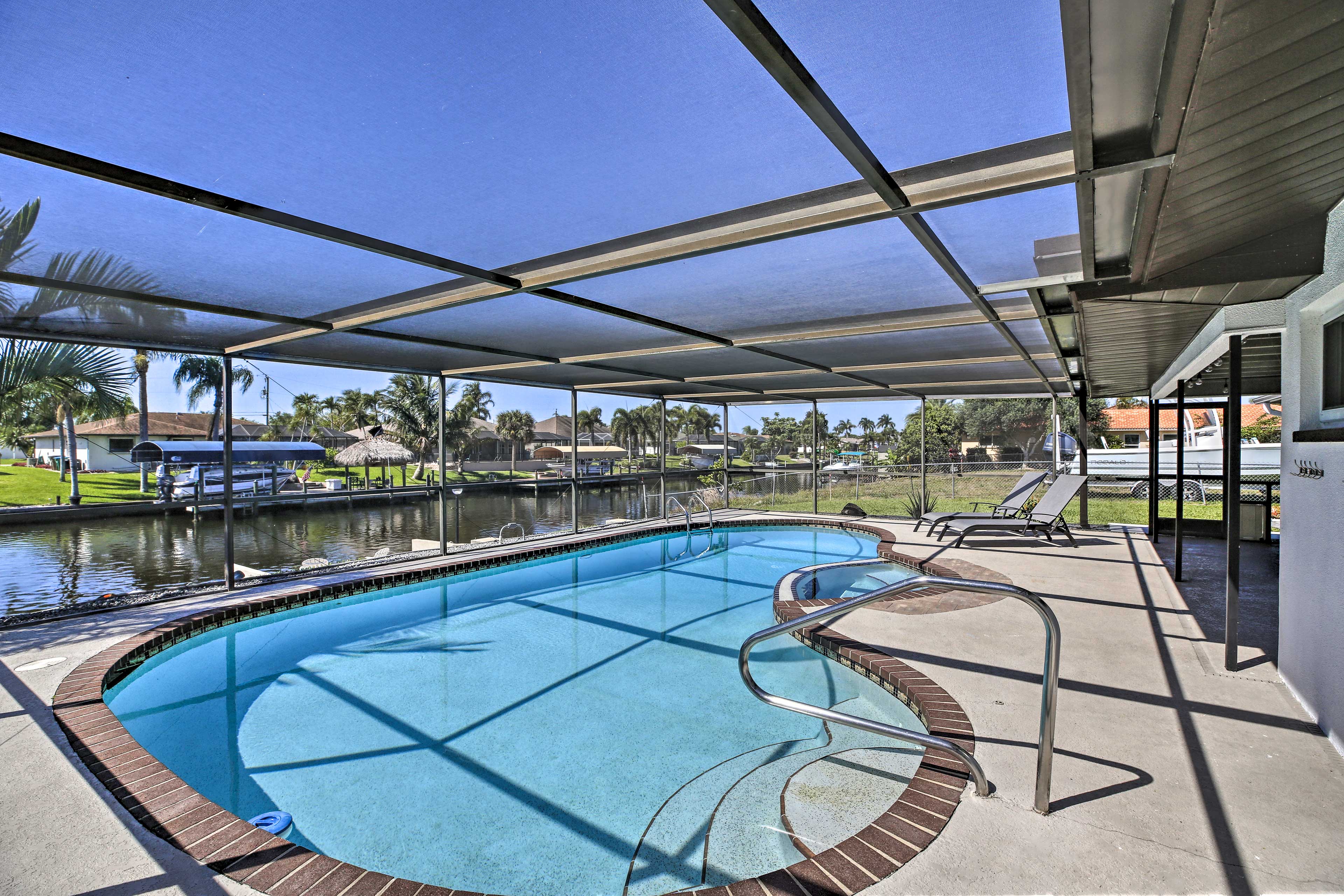Property Image 1 - Canalfront Home w/ Dock: Swim, Golf & Explore!