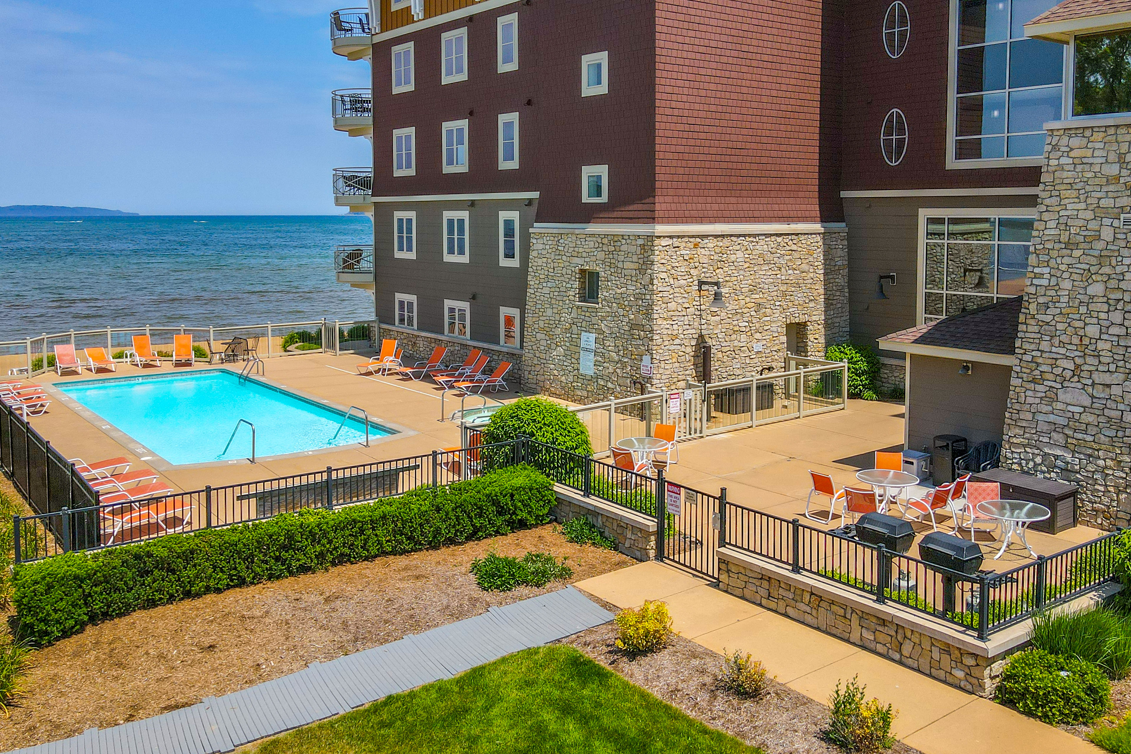 Property Image 1 - Beachfront Traverse City Resort Condo w/ Pool