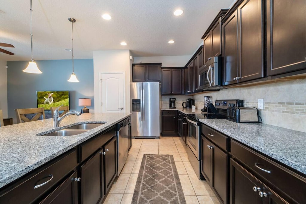 Modern Full Size Kitchen with Barstool Seating