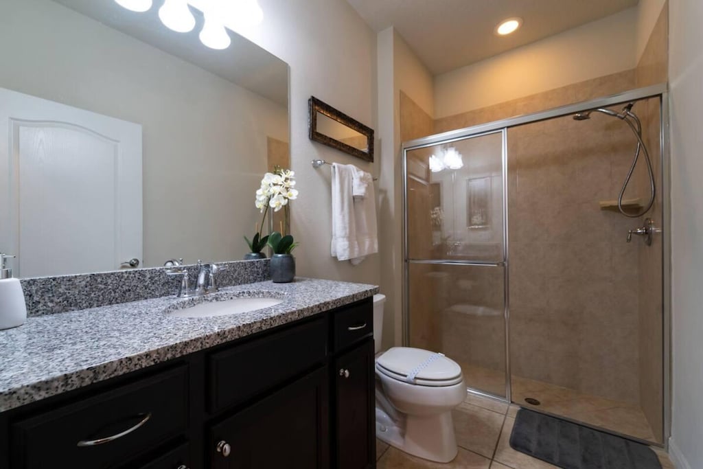 Gorgeous Bathroom with Walk in Shower and Single Sink Vanity