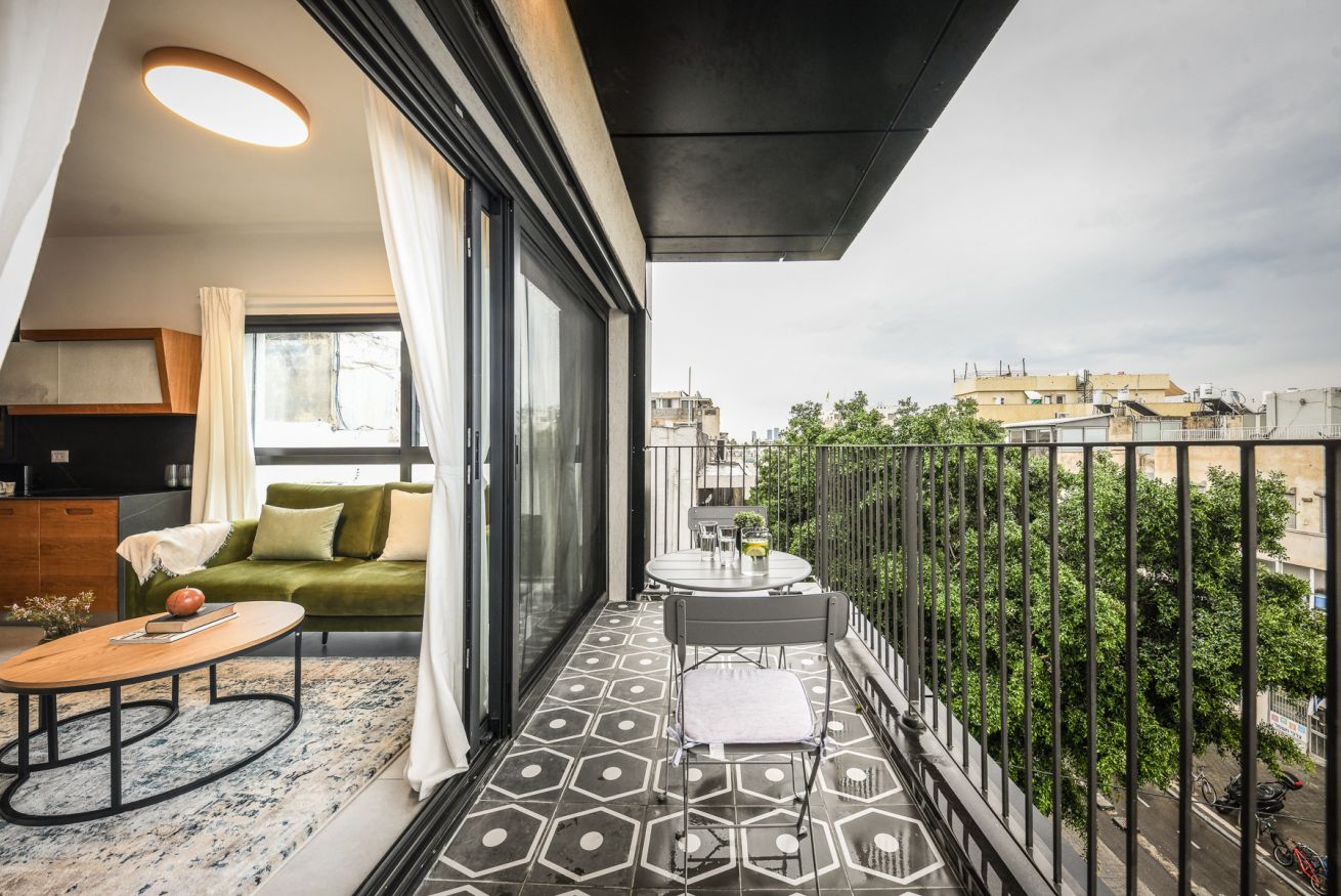 Property Image 2 - Stylish 2BR Apartment with Balcony and Urban View