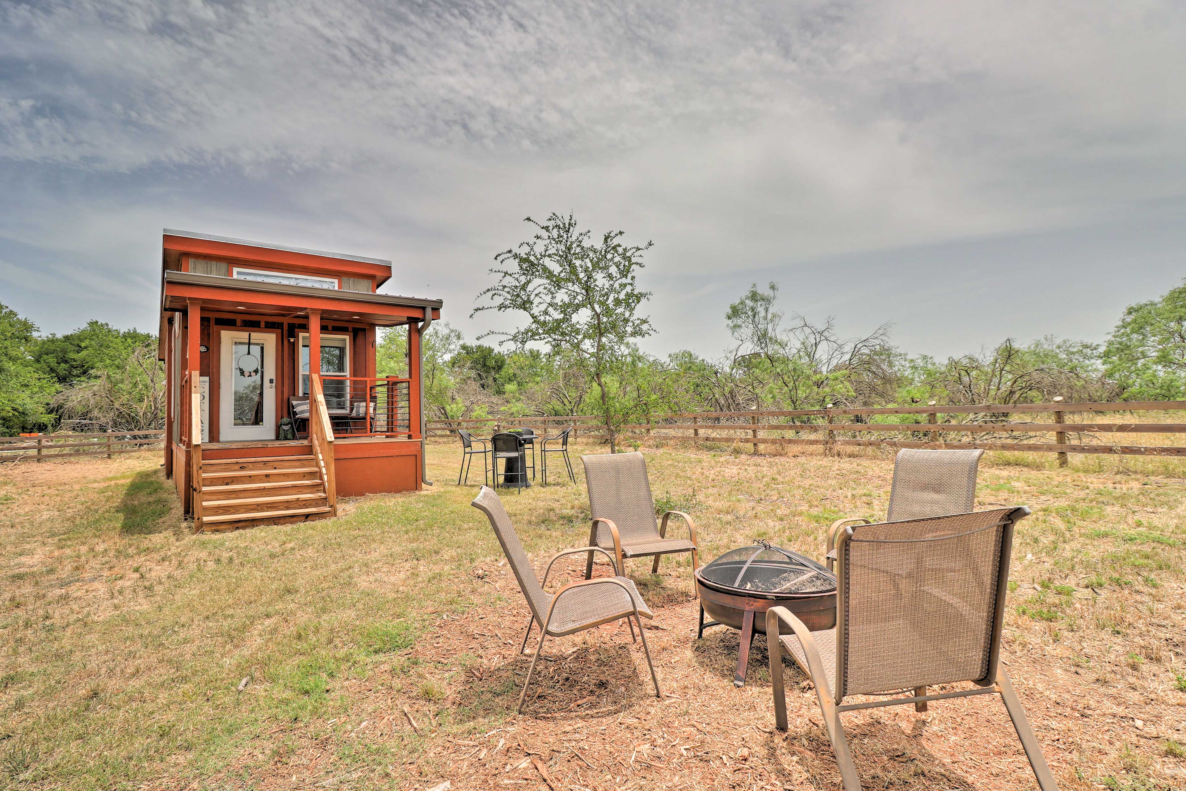 Property Image 1 - Modern ‘Sunset Cabin’ w/ Wood Fire Pit!