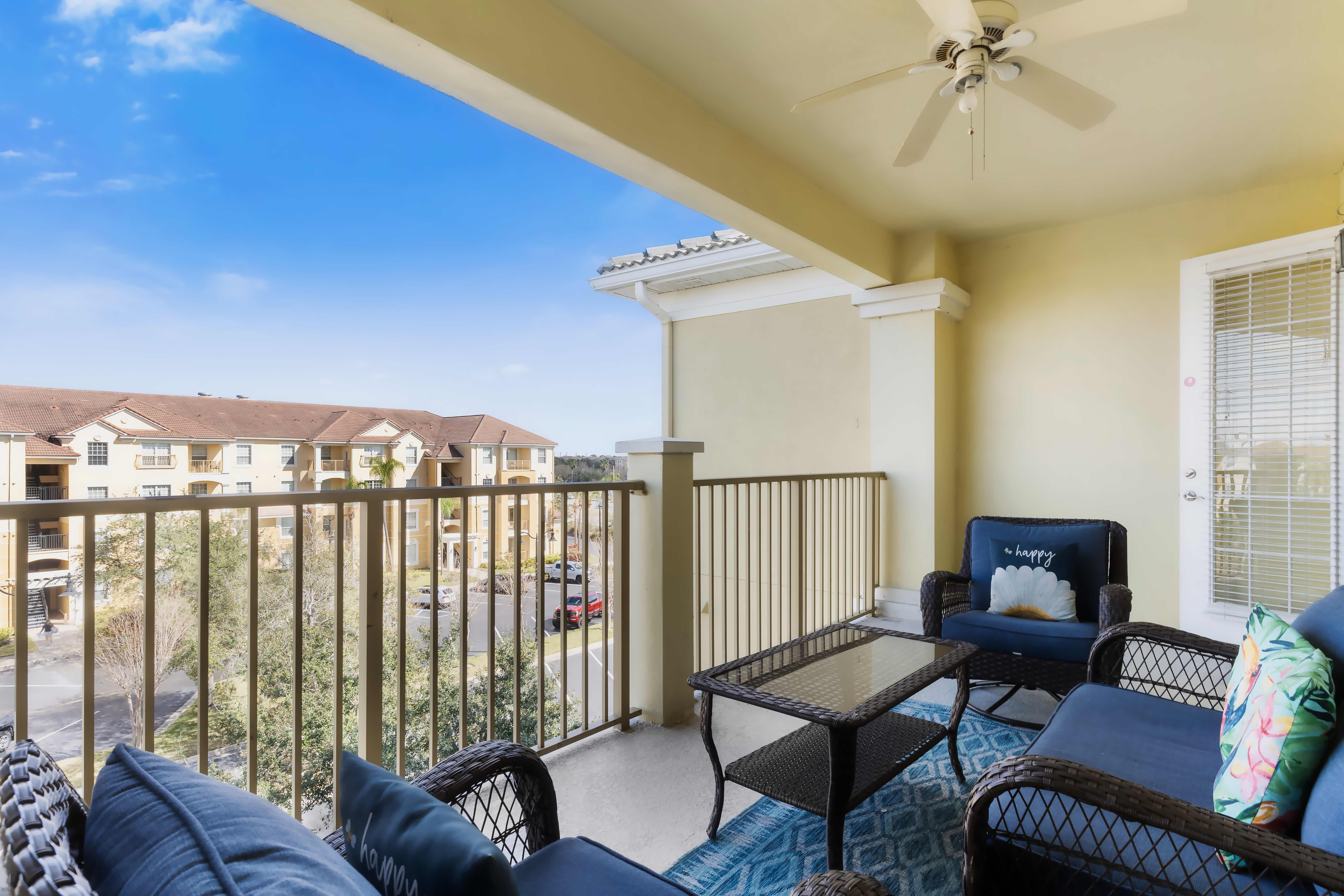 This outdoor view boasts a harmonious blend of relaxation and entertainment, featuring inviting seating areas that adds to the tranquil ambiance.