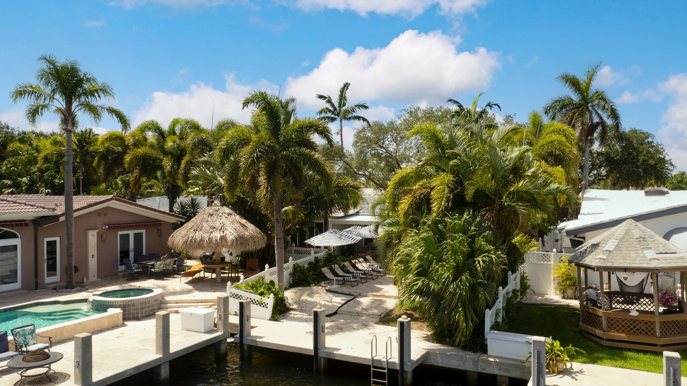 Your retreat is right on the canal and features a private pool and dock.