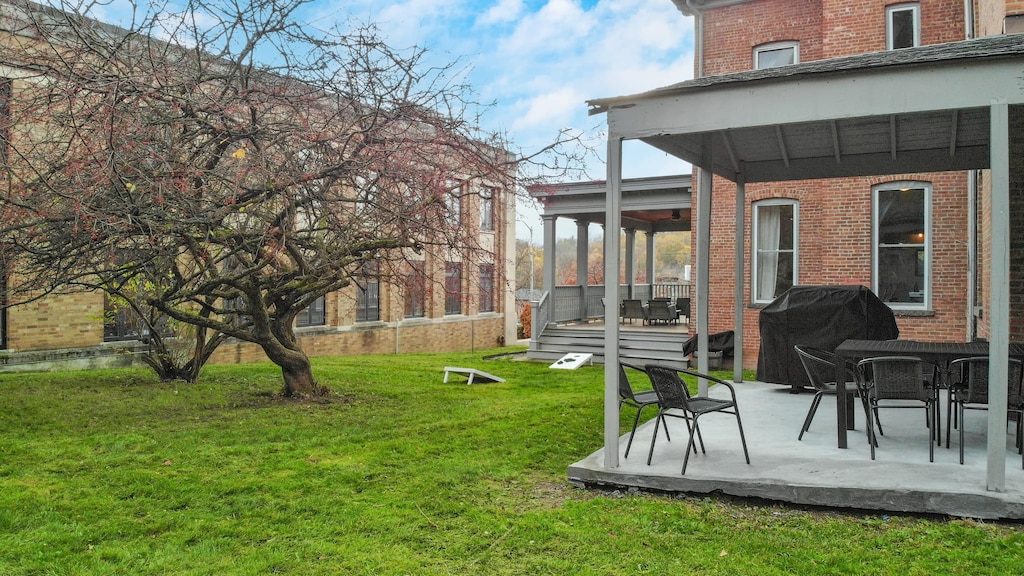 Large green space for lawn games like cornhole.
