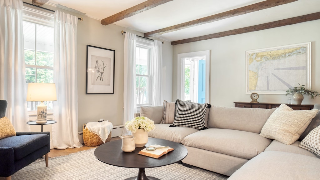 Enter into the front living room after a day of boating or fishing at Laurel Lake, six minutes away.