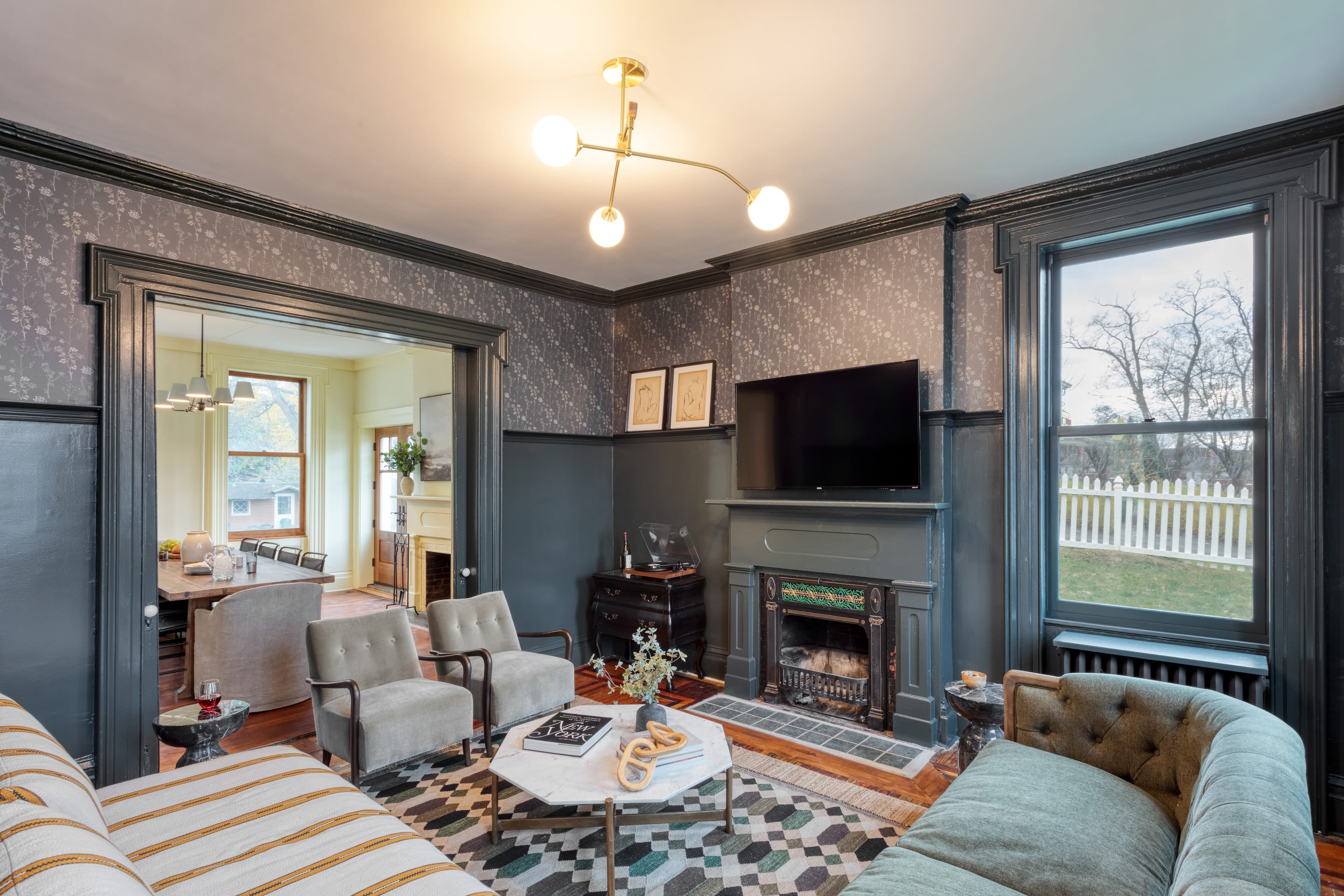 Living room features a TV and fireplace. (Main house)