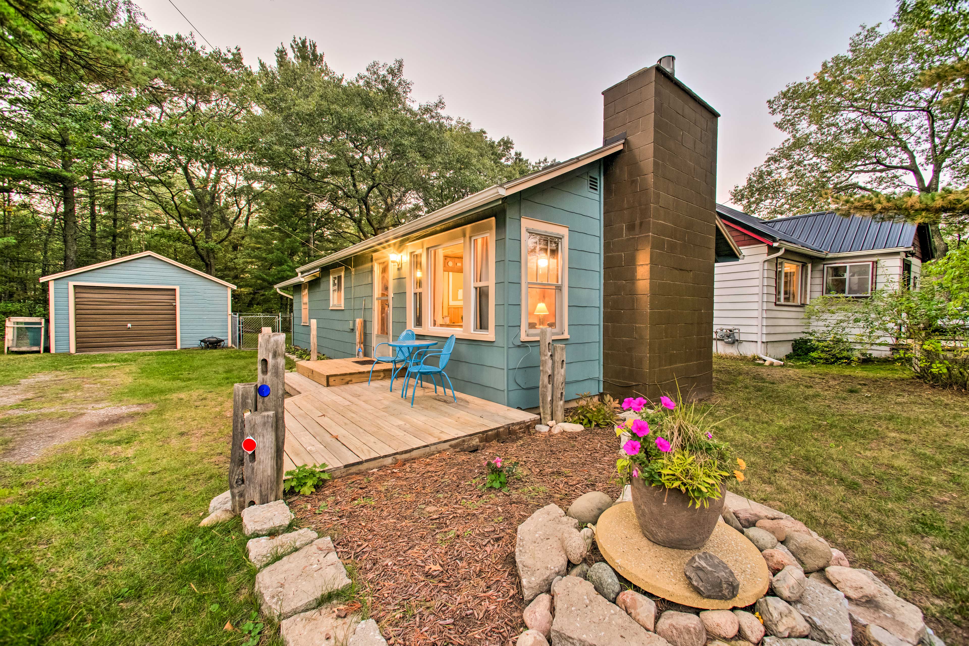 Property Image 1 - East Tawas Cabin w/ Deck, Backyard & Fire Pit!