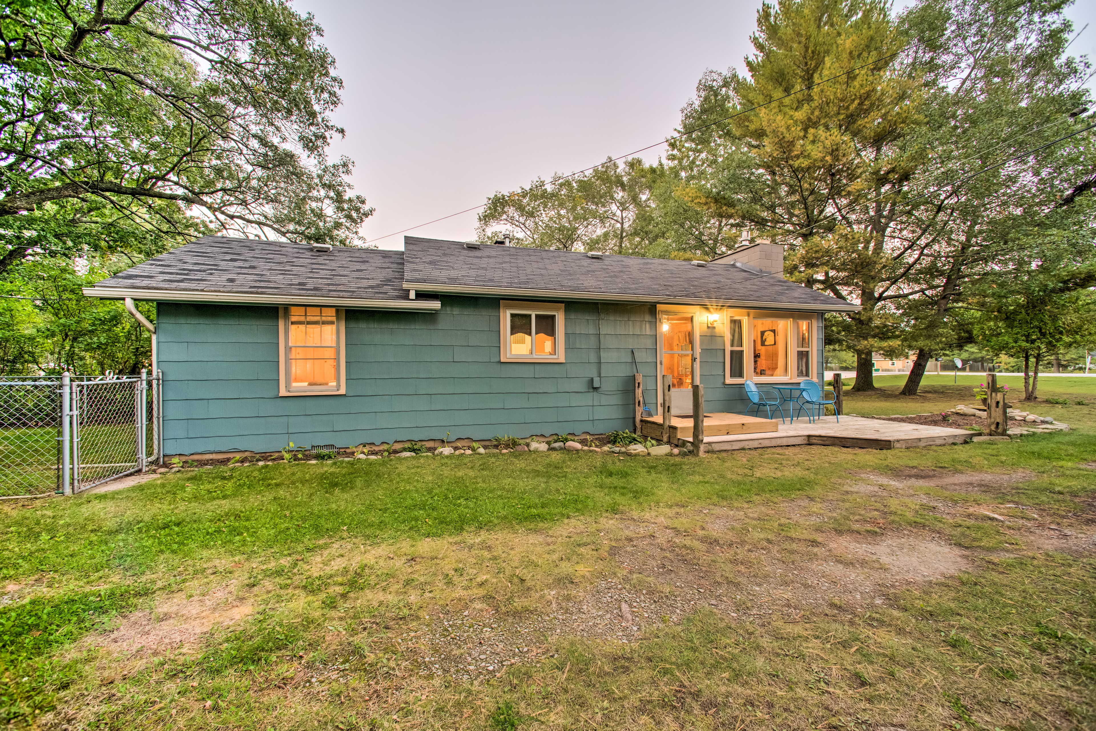 Property Image 2 - East Tawas Cabin w/ Deck, Backyard & Fire Pit!