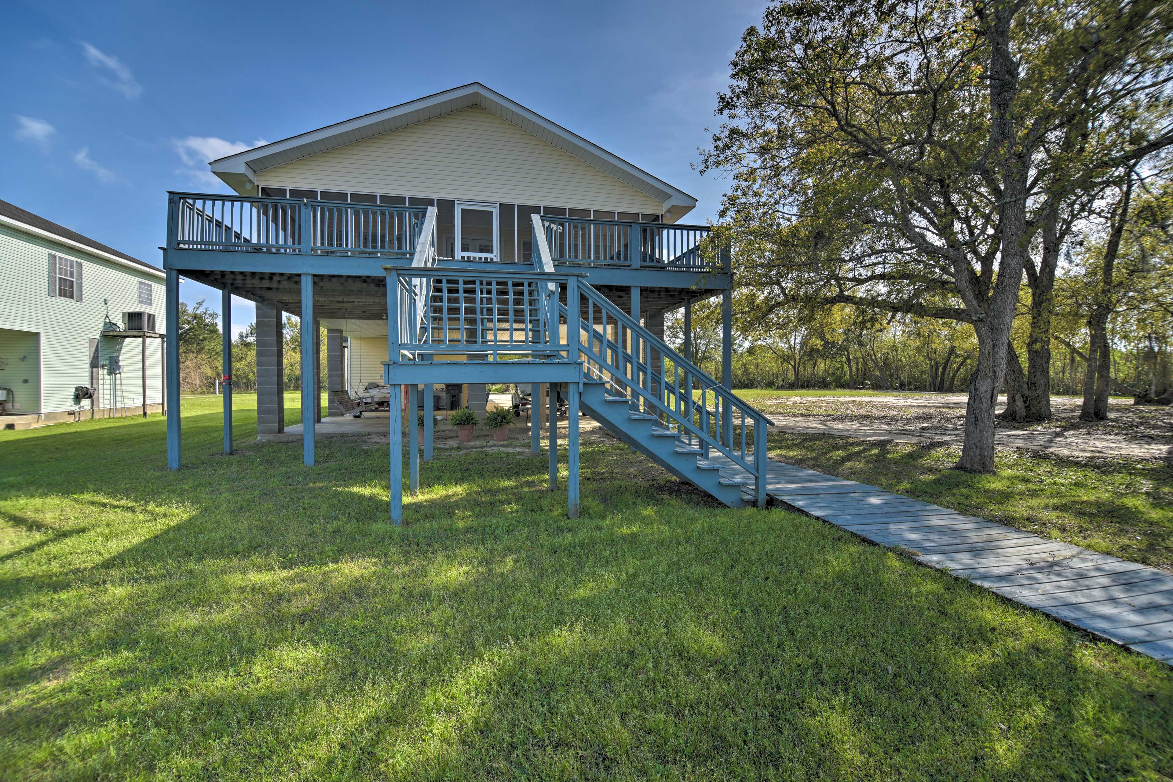 Property Image 1 - Fish at Canalfront Bay St Louis Home - Dock & Deck