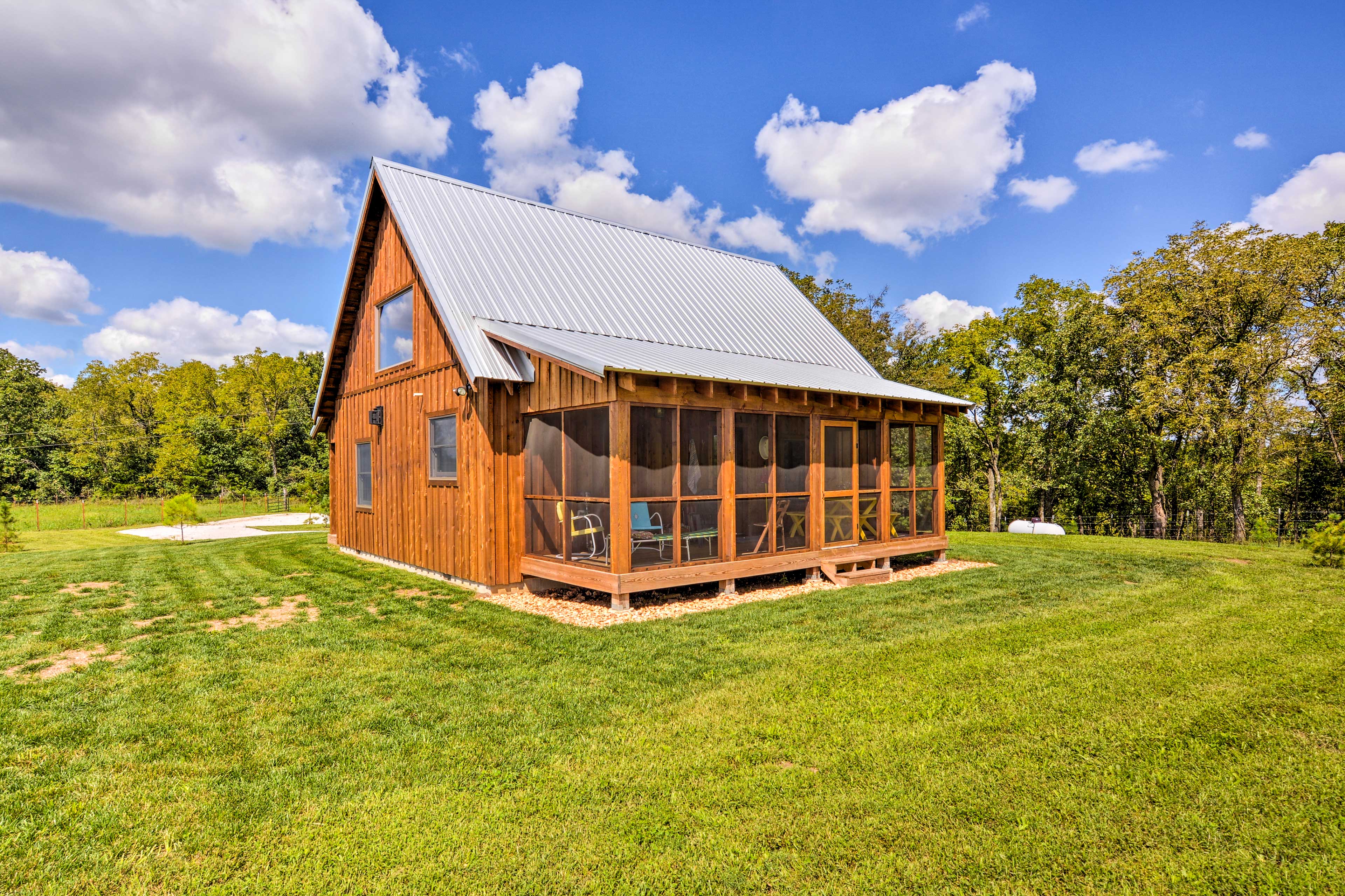 Property Image 1 - Greenfield Cabin w/ Screened-In Porch & Fire Pit!