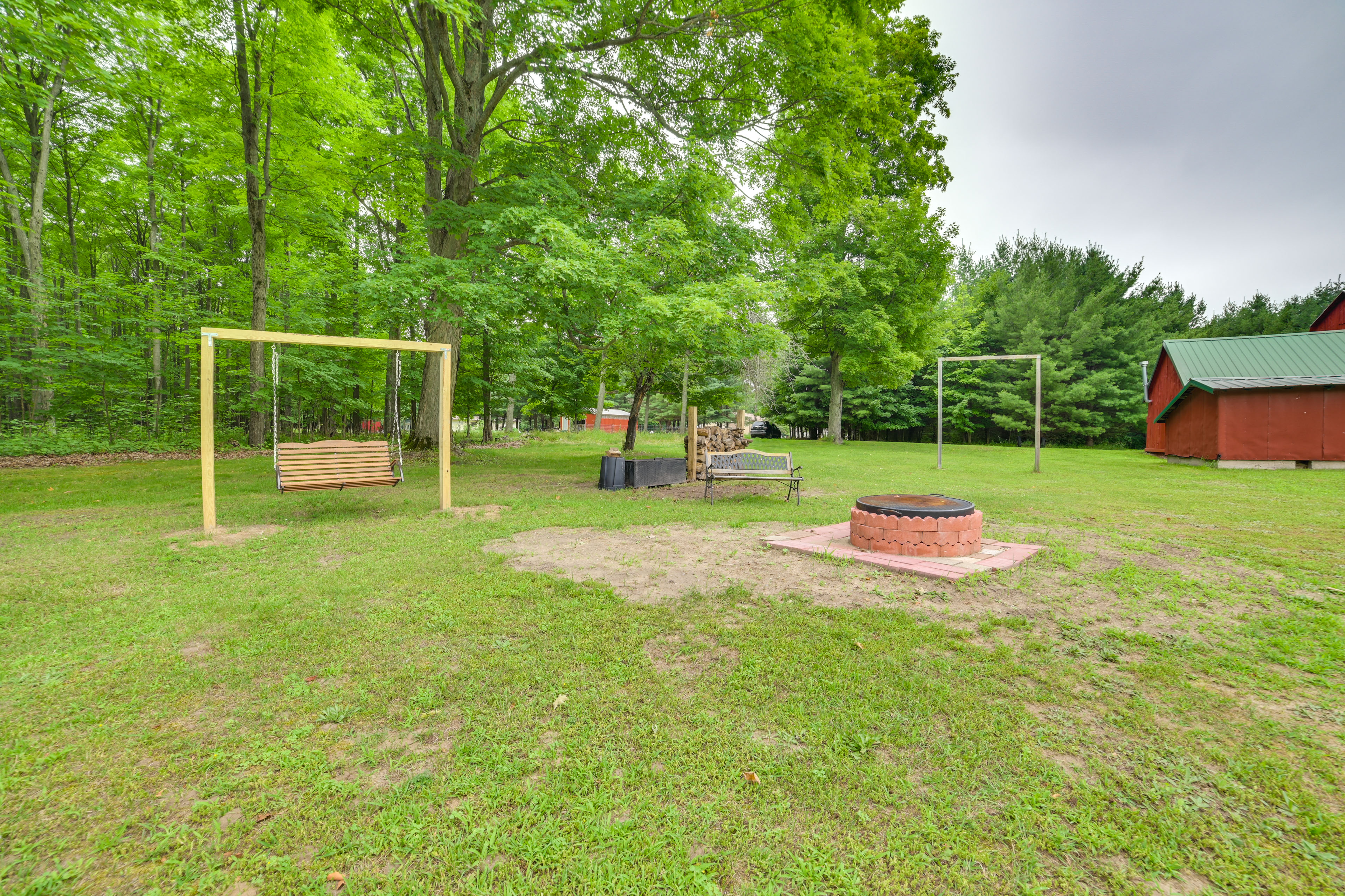 Property Image 2 - Fife Lake Farmhouse: Peaceful Yard & Fire Pit!