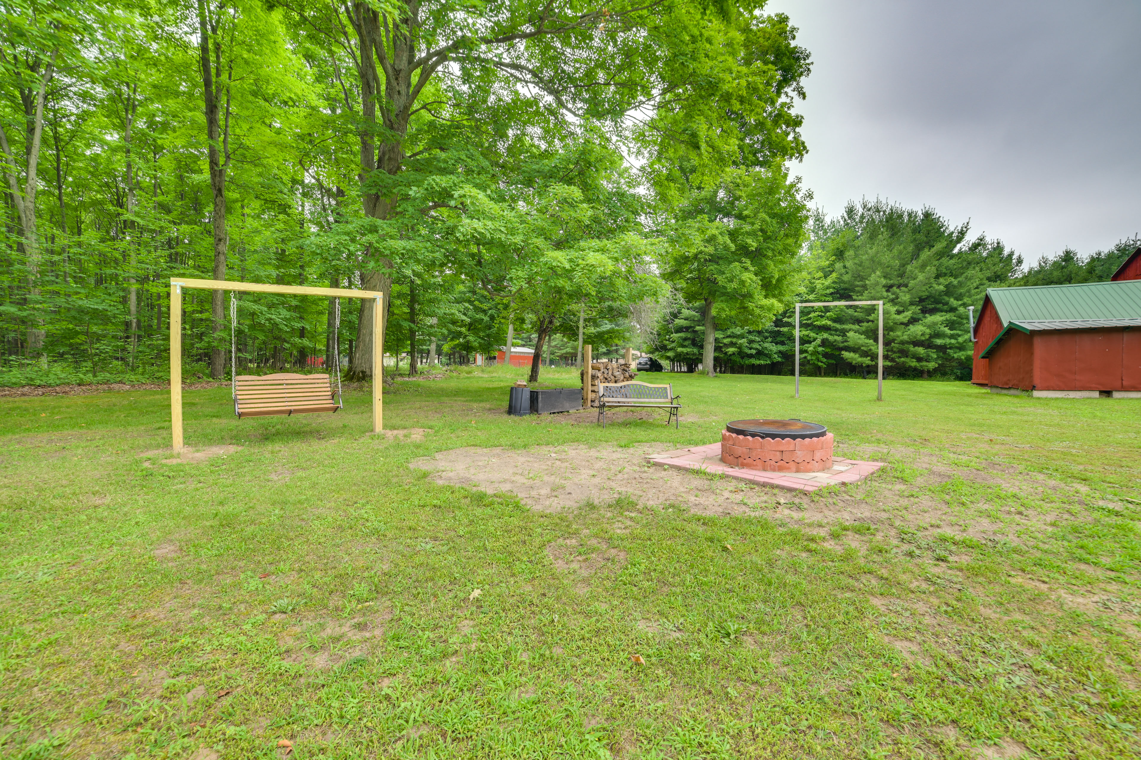 Property Image 2 - Fife Lake Farmhouse: Peaceful Yard & Fire Pit!