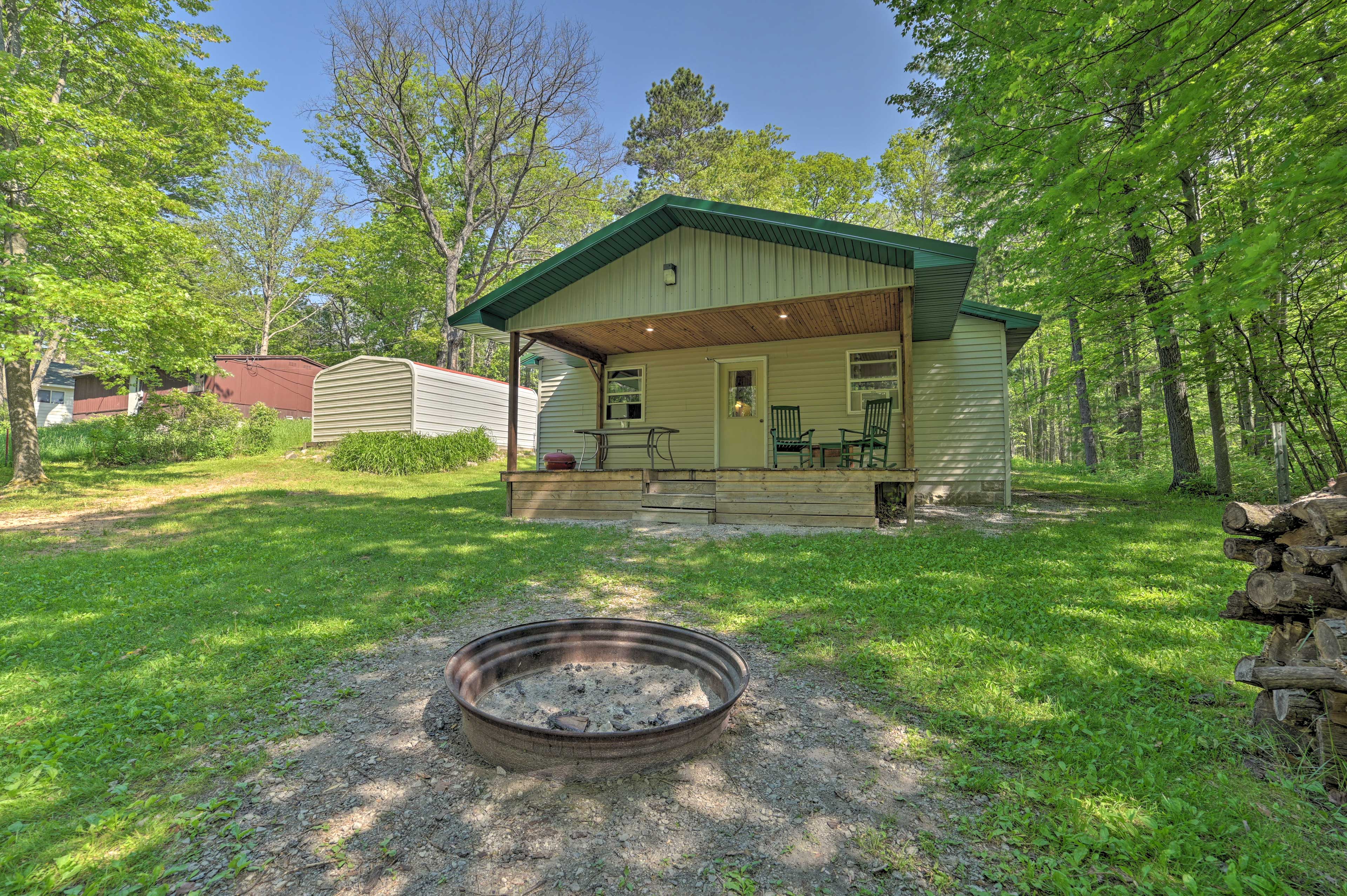 Property Image 2 - Rustic Wooded Retreat w/ Fire Pit, Near Trails!