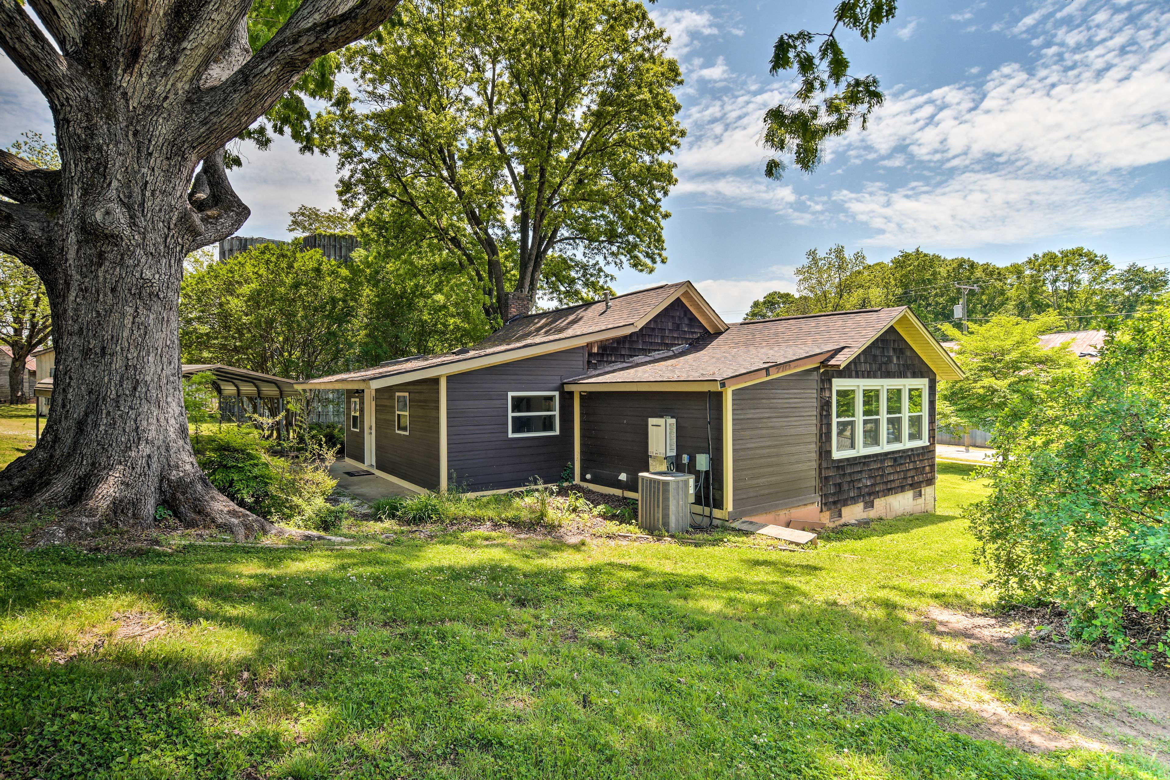 Property Image 2 - Cozy Cottage: Yard + Deck, Walk to Downtown!