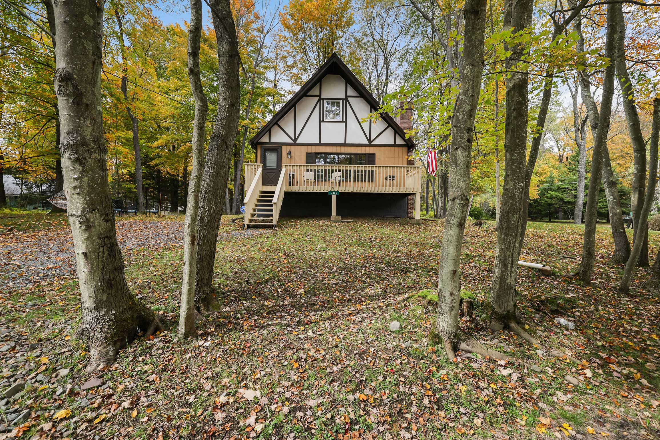 Property Image 1 - Tree-Lined Pocono Lake Cabin, Game Room On-Site!