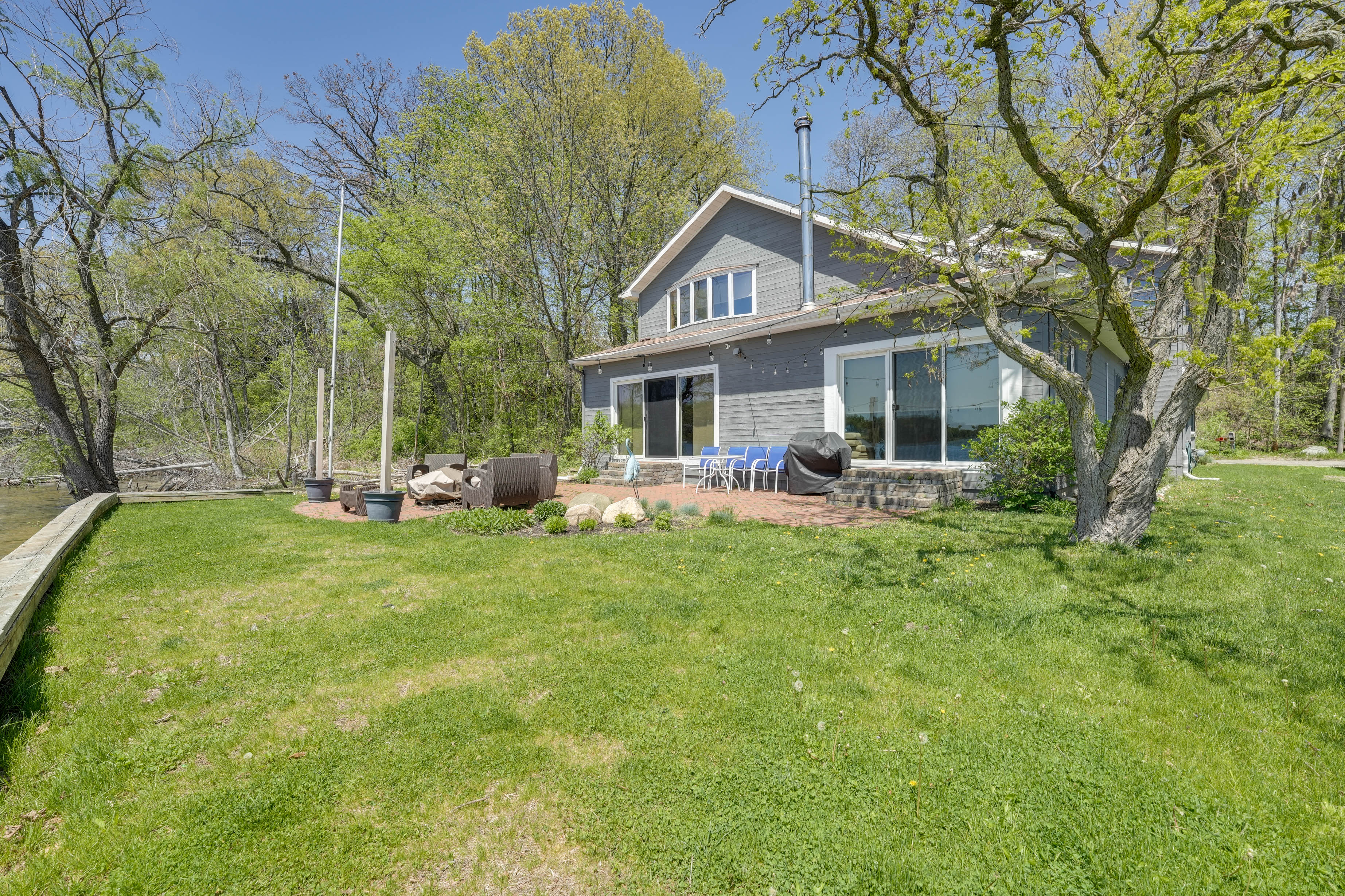 Spacious Delton Home w/ Fire Pit + Lake Views