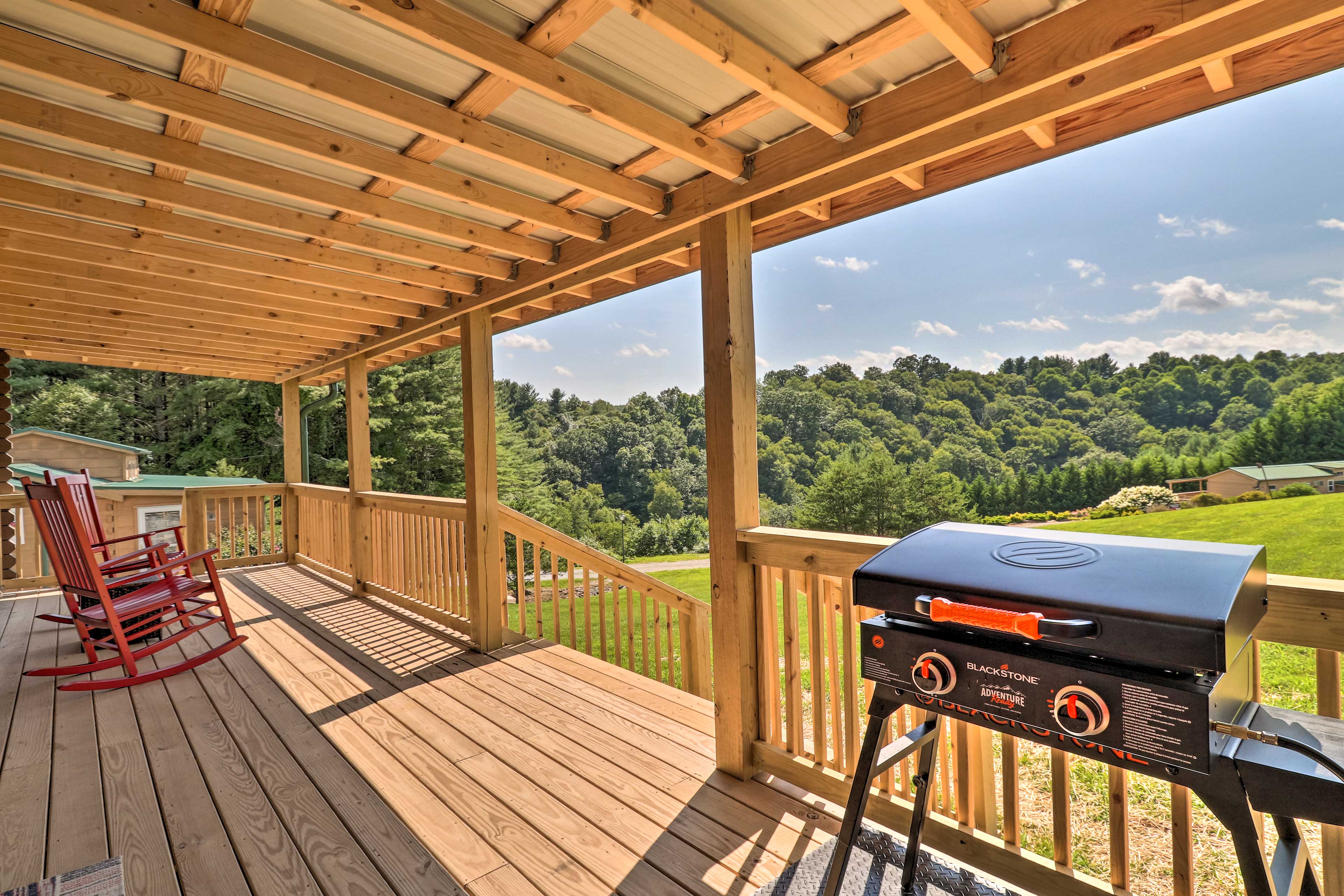 Property Image 1 - Sparta Cottage Cabin w/ Covered Deck + River Access!