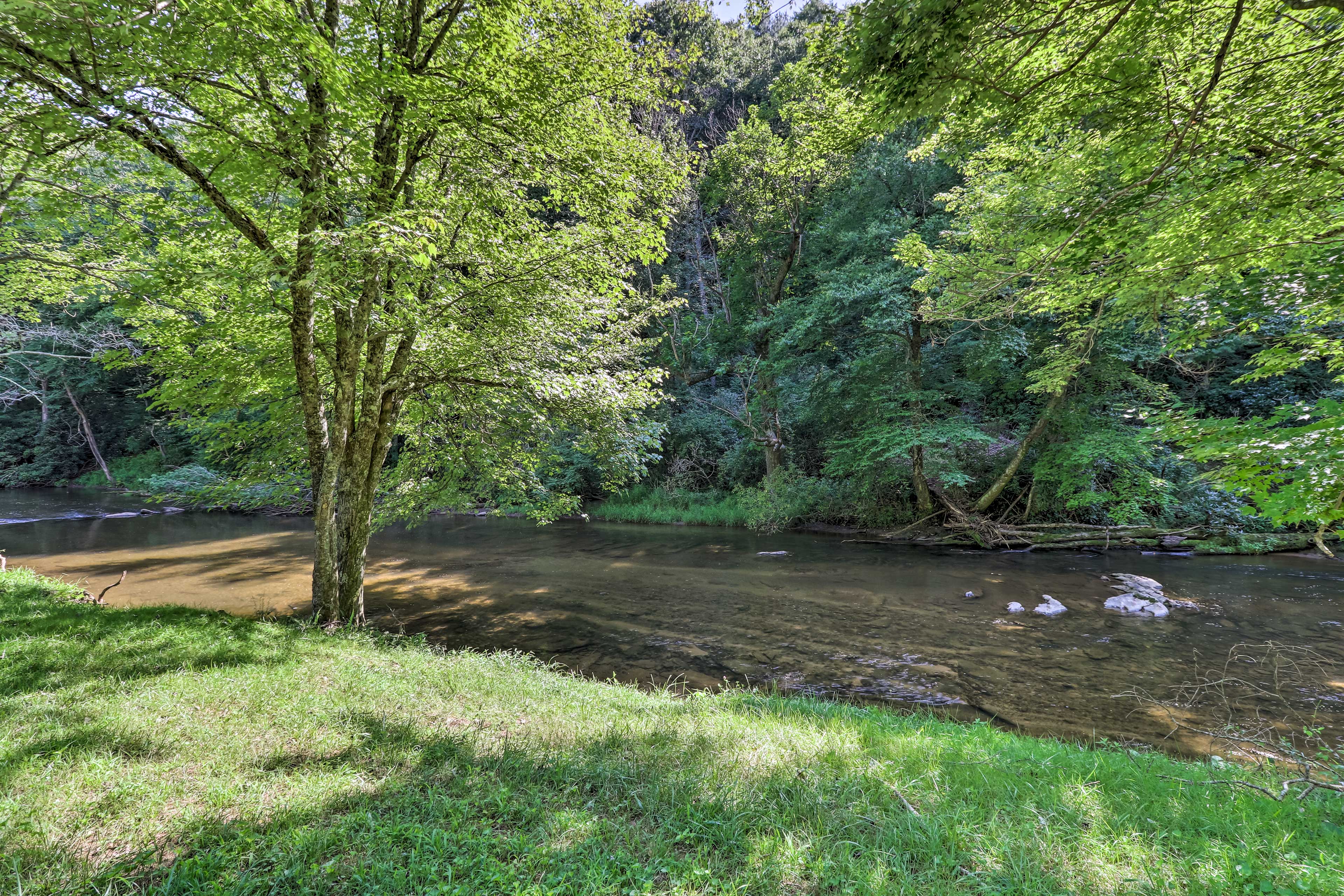 Property Image 1 - Sparta Cottage Cabin w/ Covered Deck + River Access!