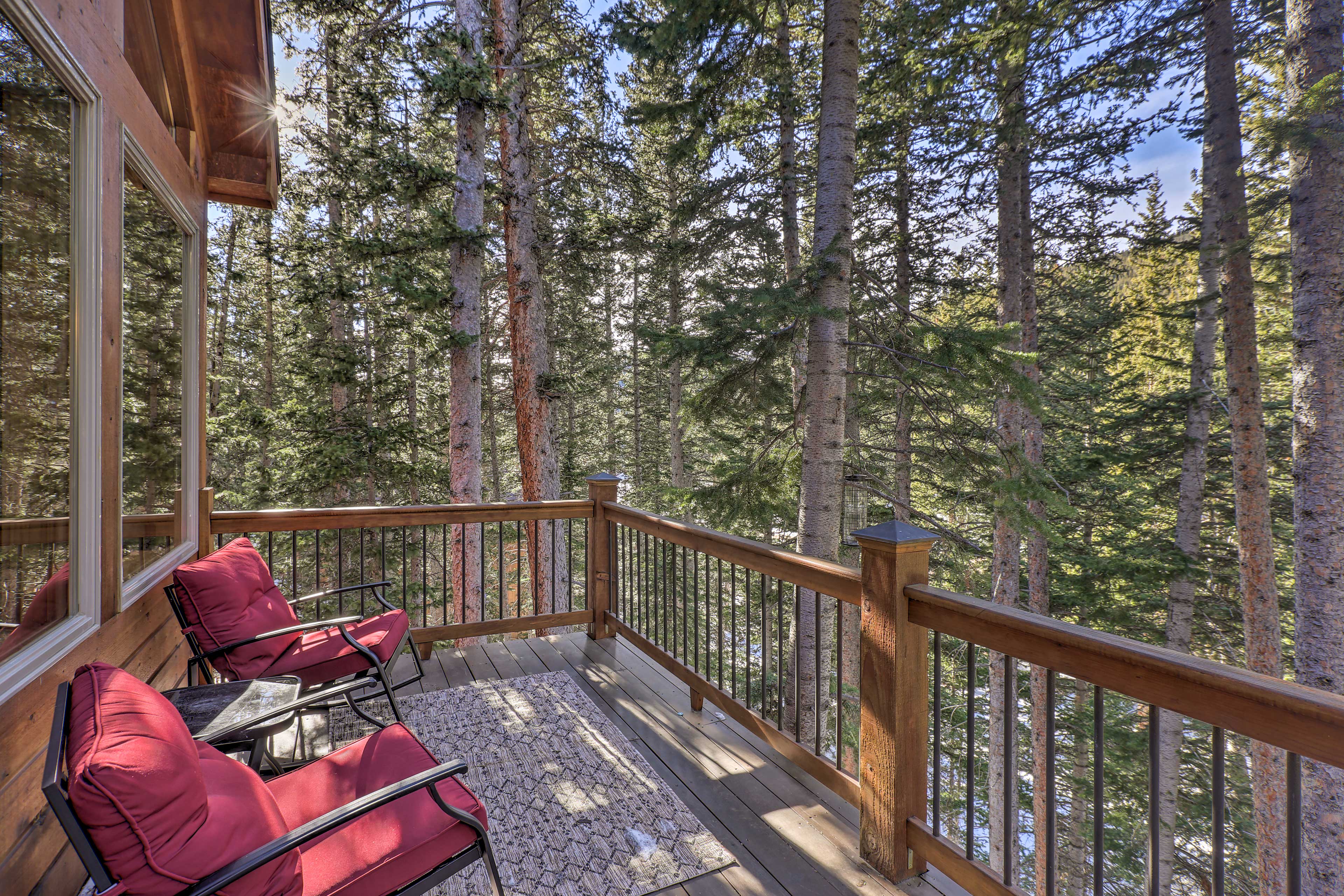 Property Image 2 - St Mary’s Lakefront Cabin w/ Deck & Wood Stove!