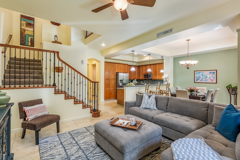 Two-story vaulted ceilings and open-concept living bring together comfort, elegance, and plenty of room to unwind.