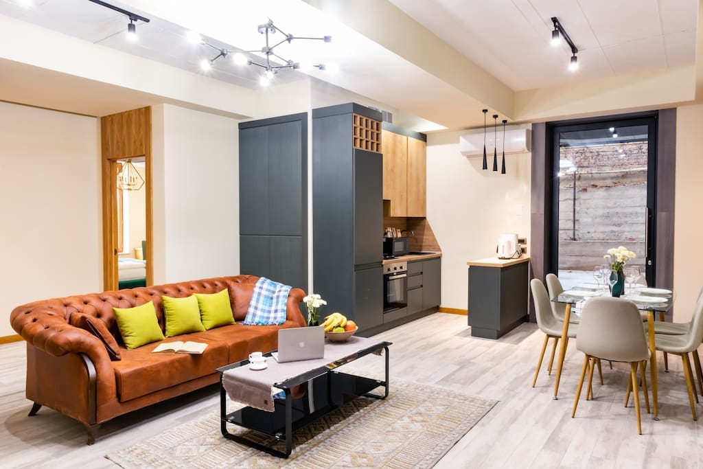 Living room joined with the kitchen and dining corner