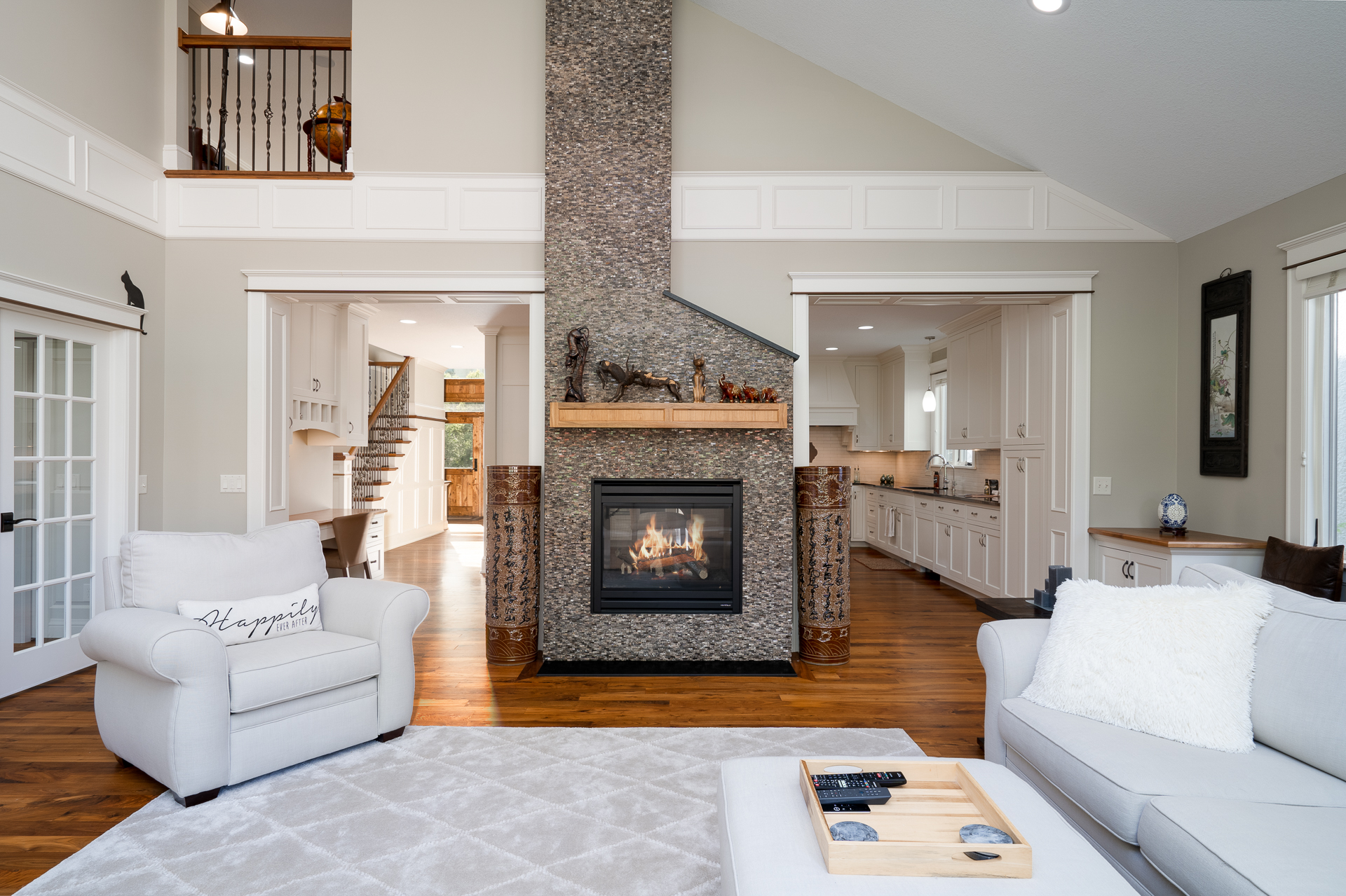 Stunning double sided gas fireplace.