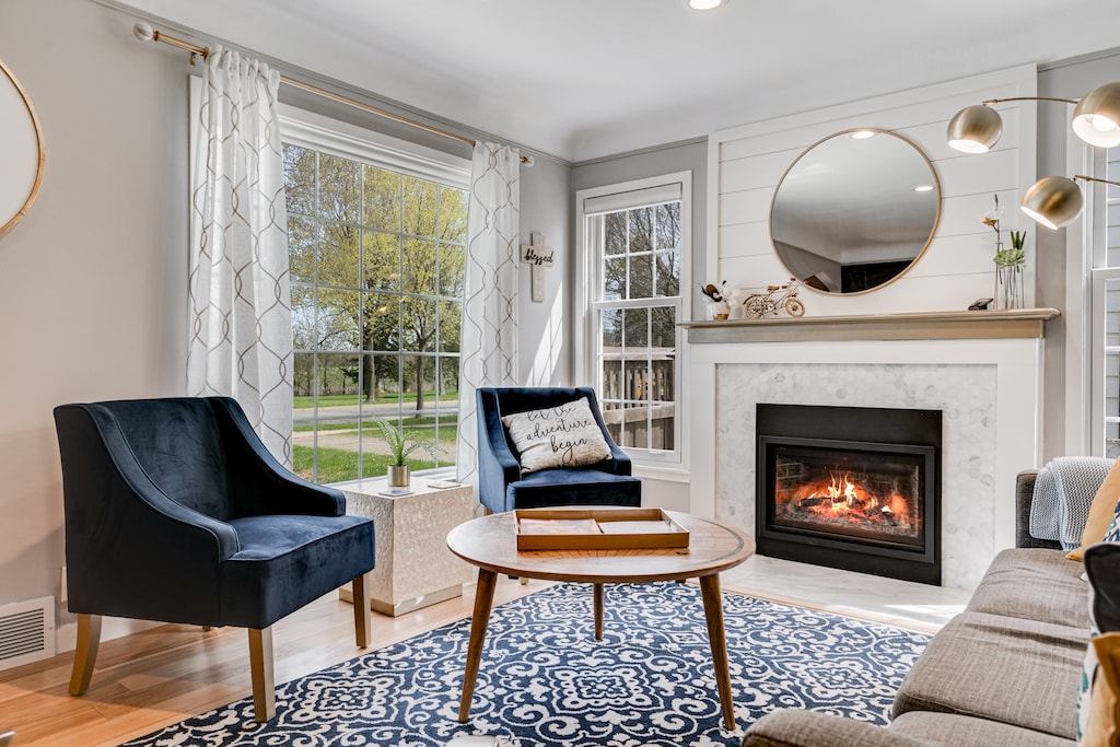Back inside, you can stay warm by the gas fireplace as you lounge in the formal living room.