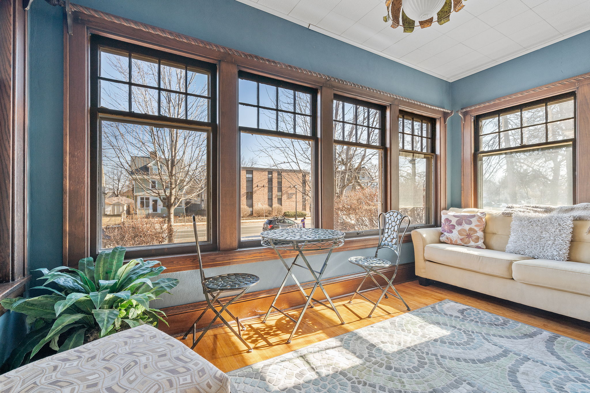 Enjoy a cup of coffee in this beautiful sunroom!