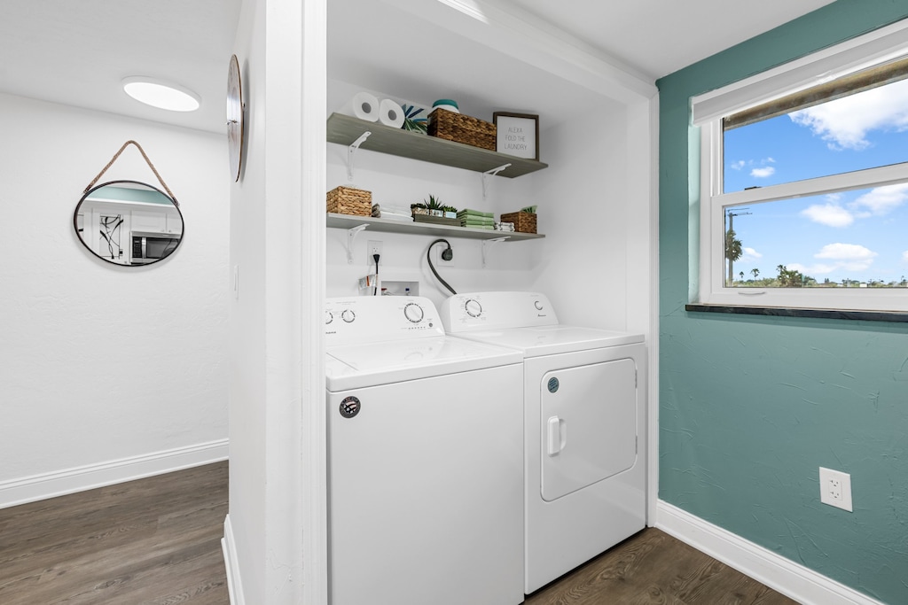 Washer and dryer conveniently located inside of the condo.