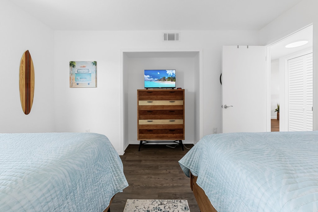 Spacious guest bedroom includes a flat screen TV!