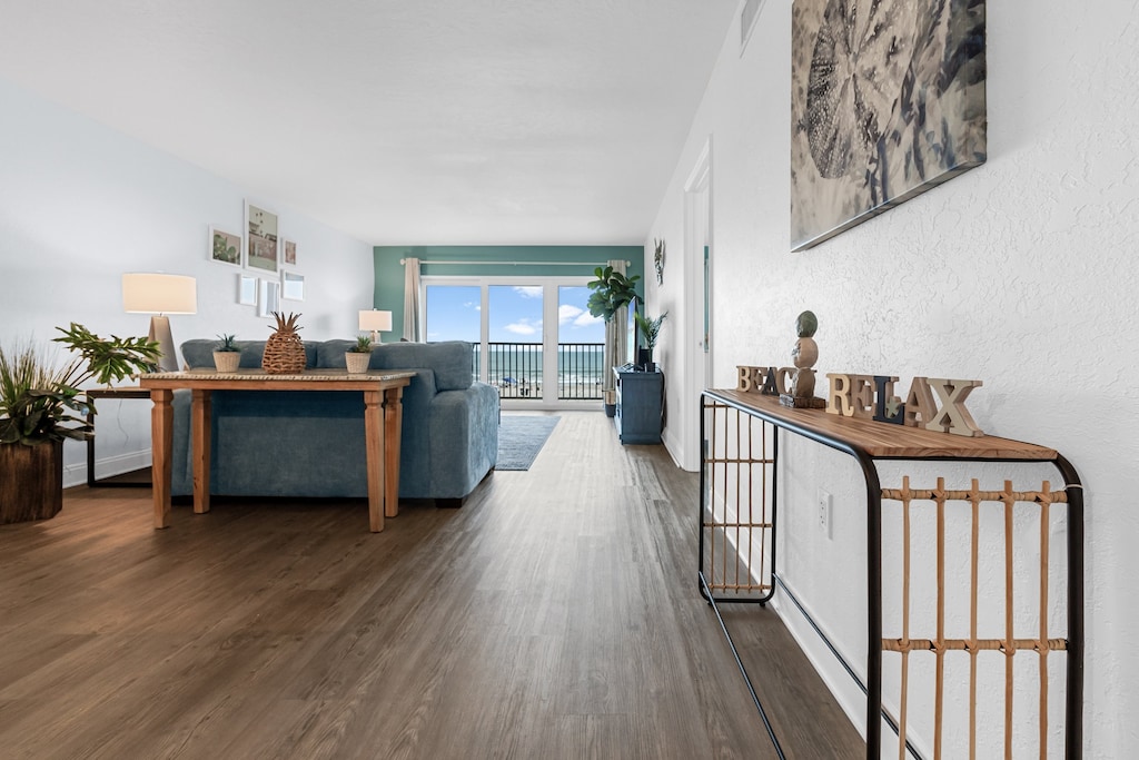 Spacious dining and living room with a modern coastal touch.