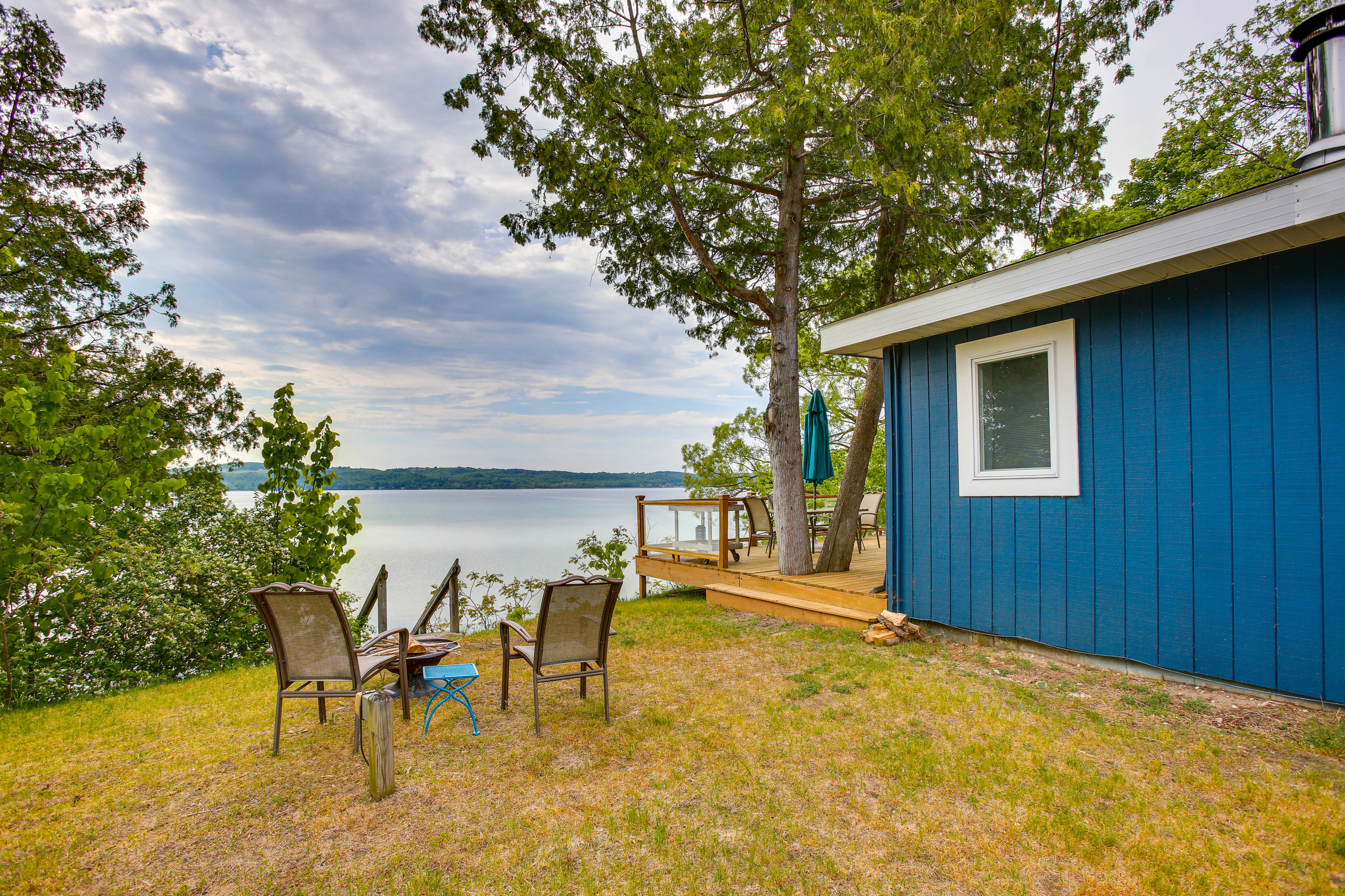 Property Image 1 - Waterfront Suttons Bay Cottage w/ Fire Pit!