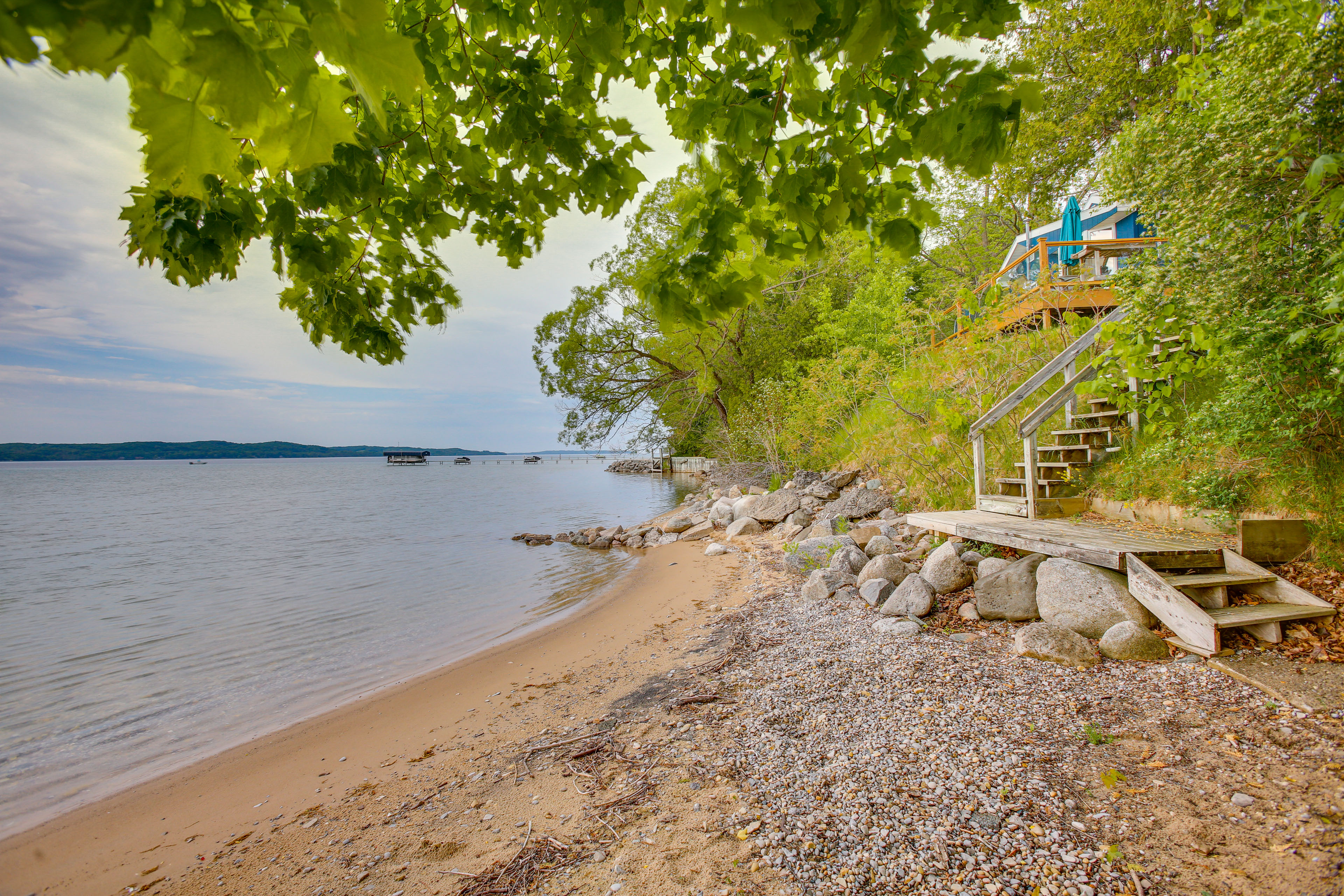 Property Image 2 - Waterfront Suttons Bay Cottage w/ Fire Pit!