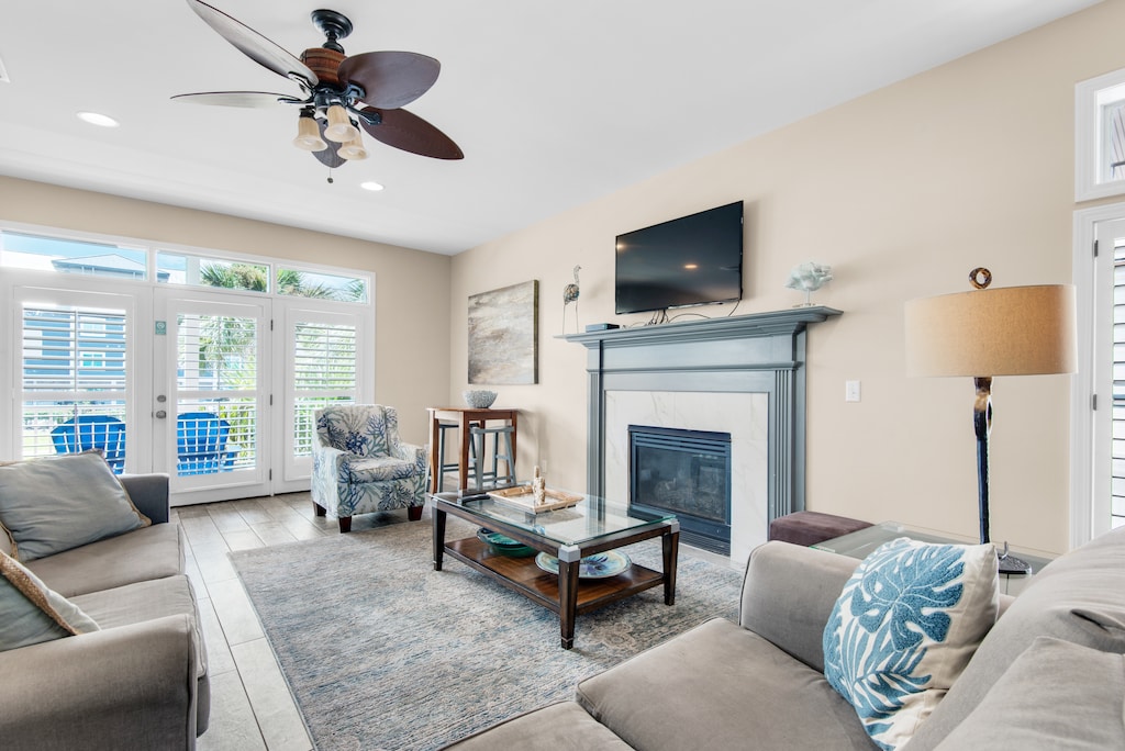 Living room with fireplace and flat screen TV