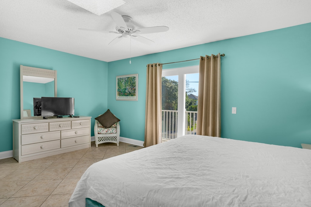 Master bedroom with balcony access