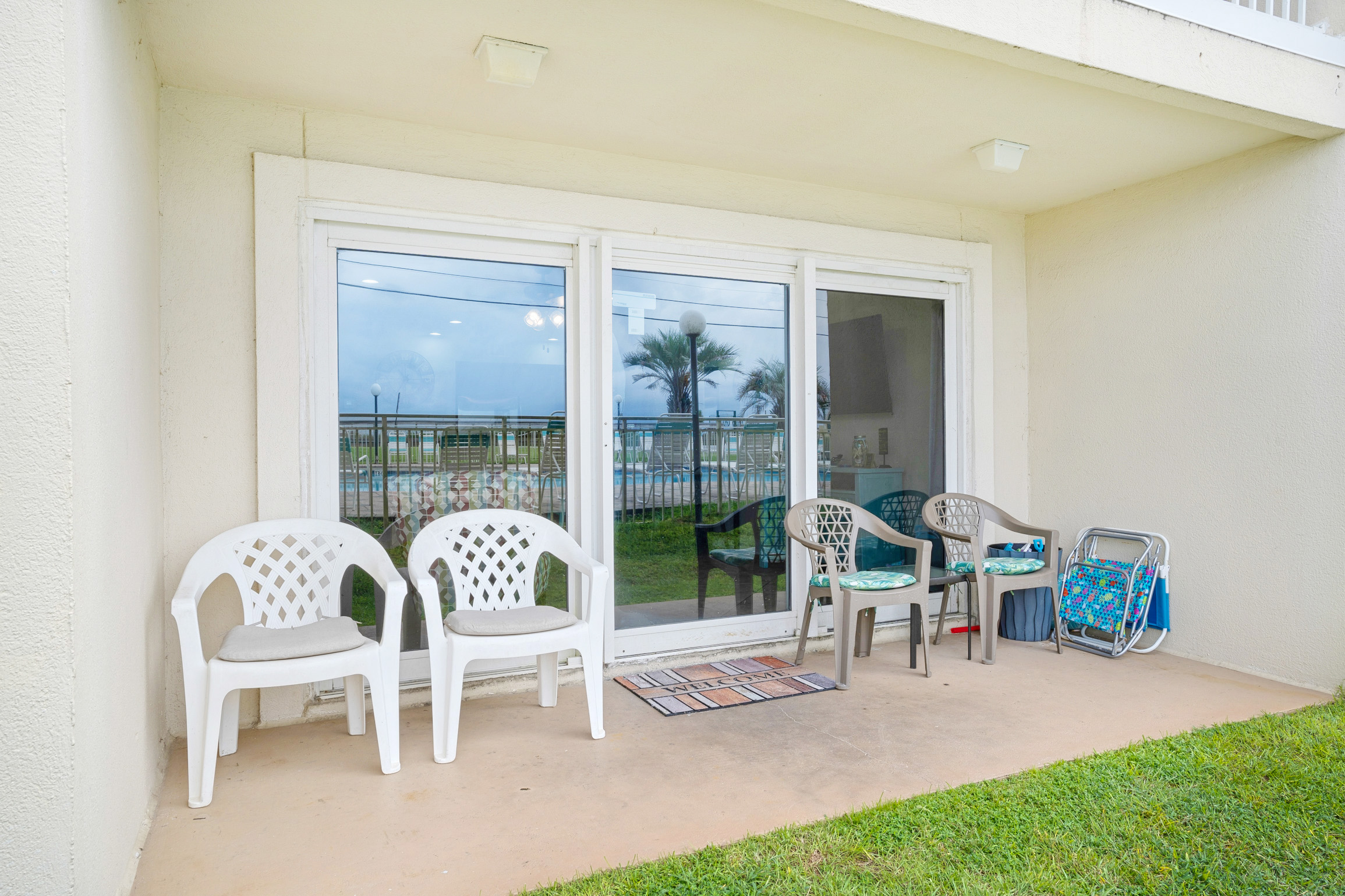 Large patio facing gulf side pool