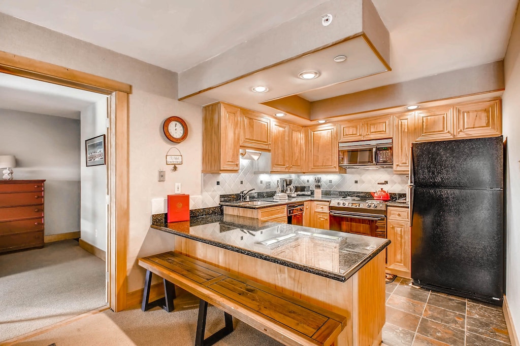 Kitchen and door to optional 2nd bedroom