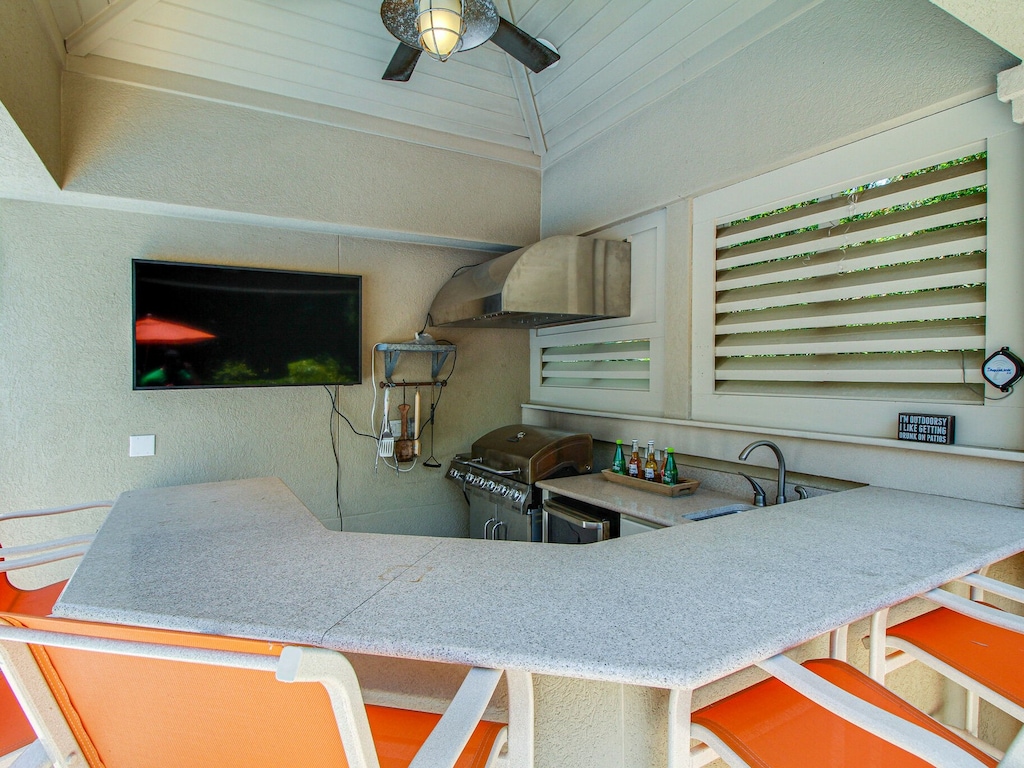 Outdoor Kitchen with TV and Bar at 1 Brigantine