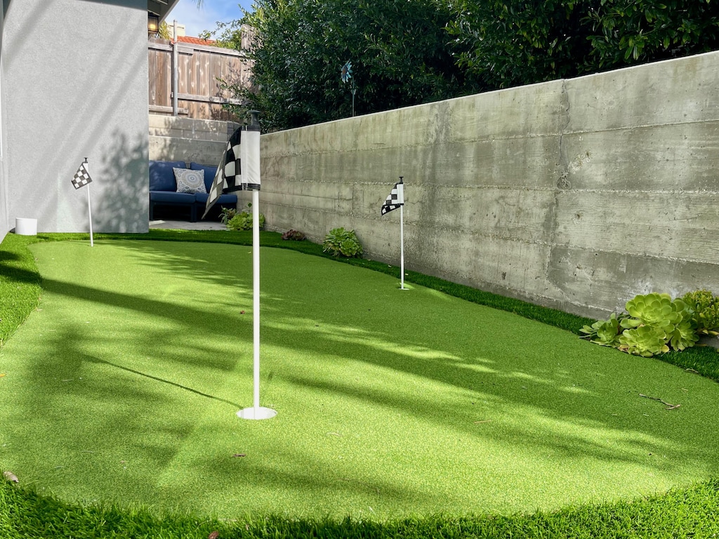This vacation home is a hole-in-one with its private putting green.